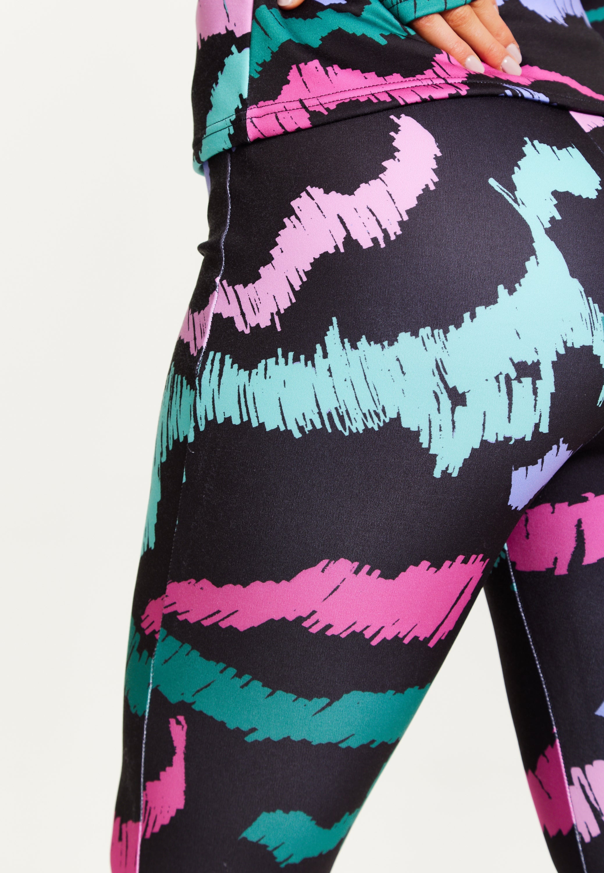 Women's Trousers in Black Abstract Print with Fleece Lining and Adjustable Stirrup Hem by Liquorish