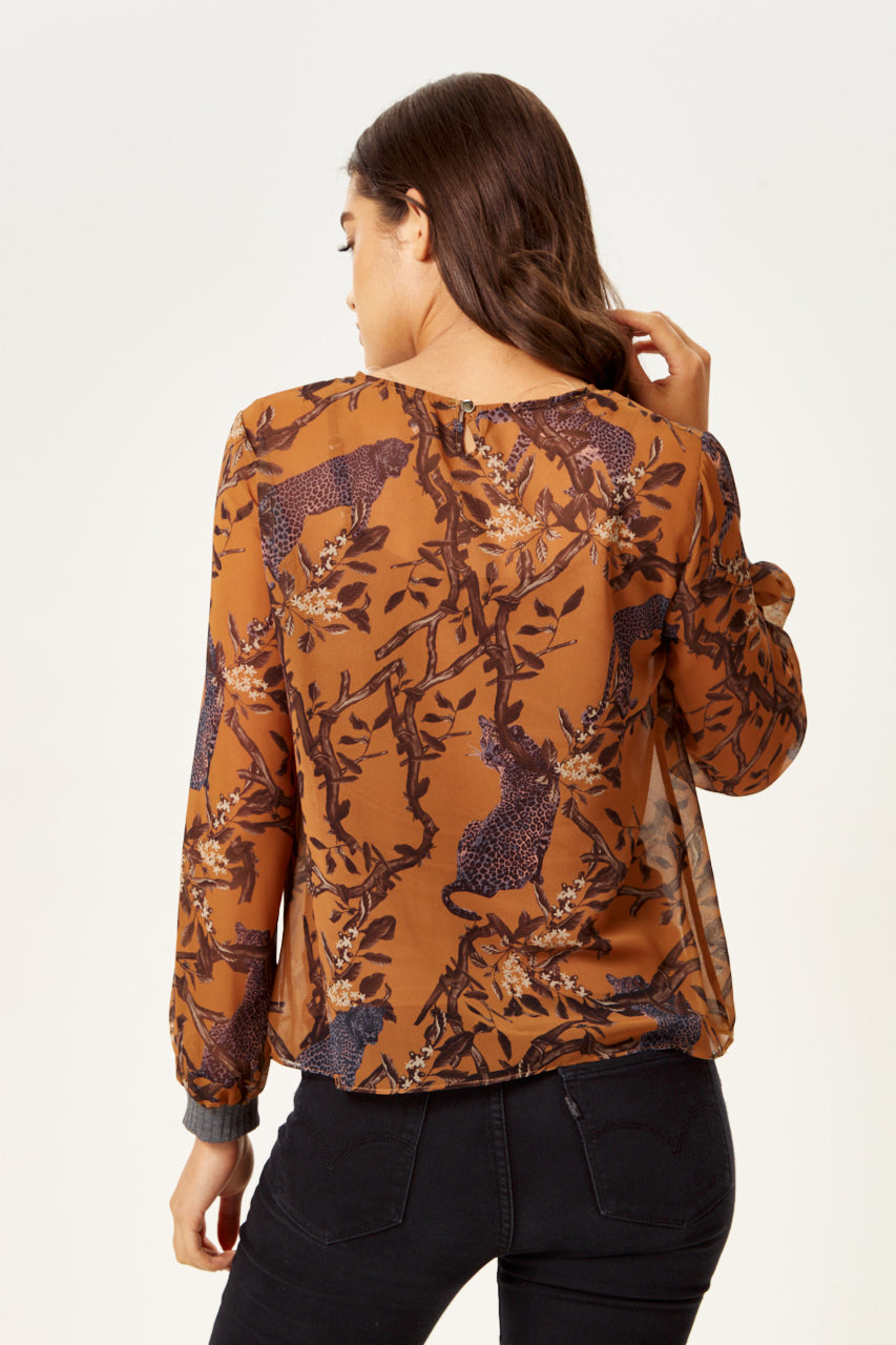 Enjoy online shopping with the stylish Women's Cheetah Print Long Sleeve Top in Grey. Shop Now!