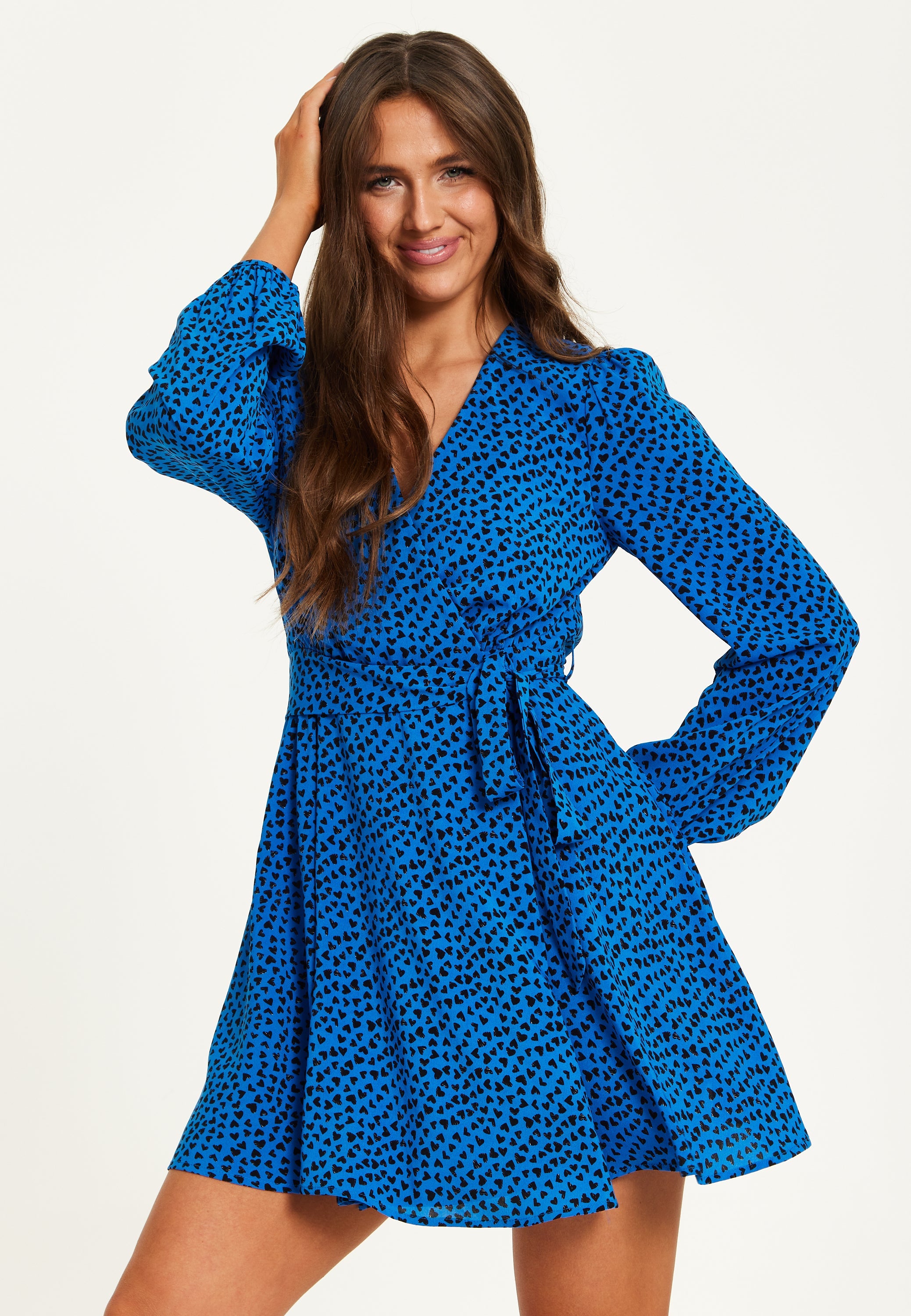Women's Mini Dress in Royal Blue with Long Sleeves and Heart Print Wrap Design by Liquorish