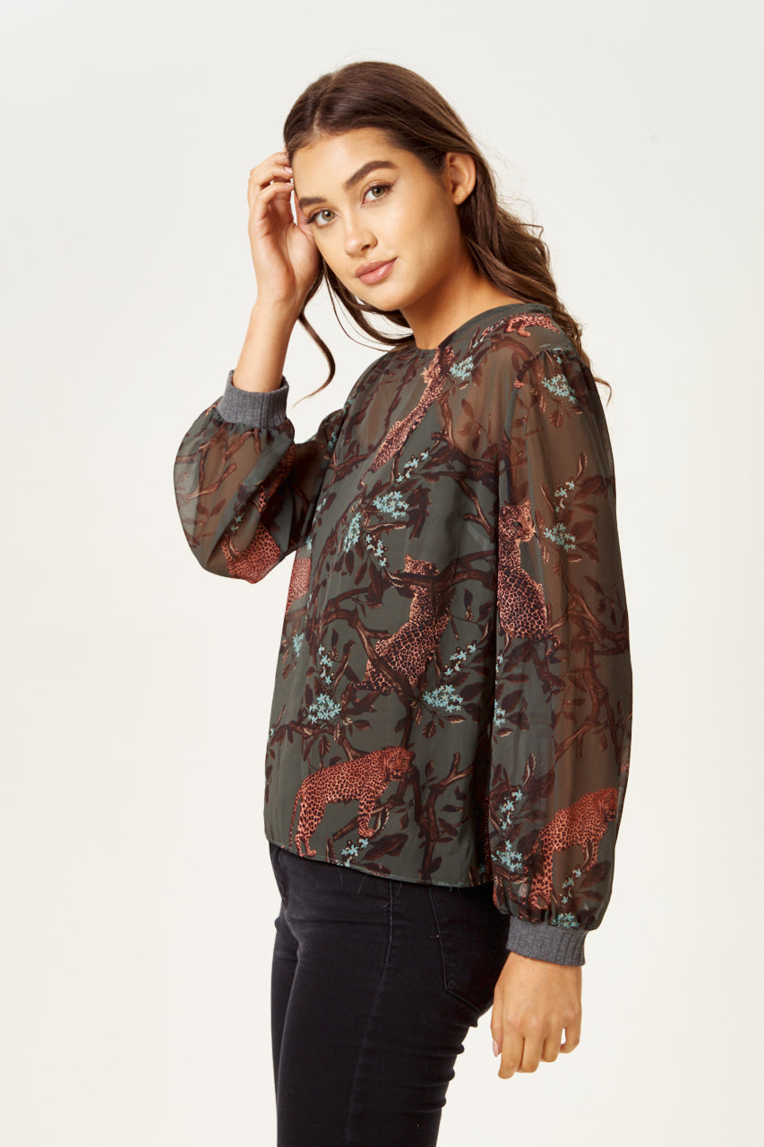 Explore women clothing stores online featuring the Women's Long Sleeve Khaki Leopard Print Top. Shop Now!