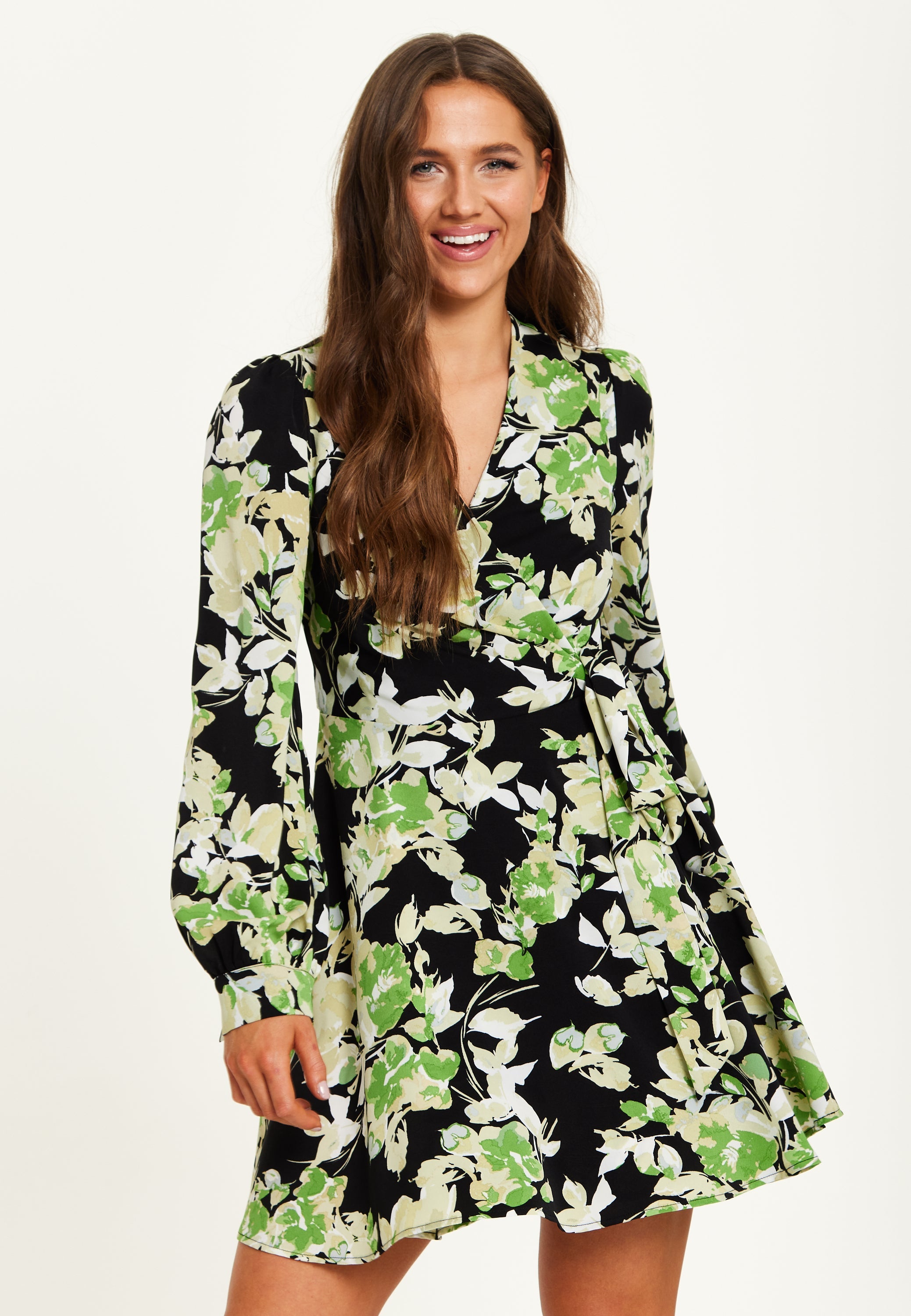 Women's Mini Dress in Black with Long Sleeves and Green Floral Print Wrap Style - Liquorish