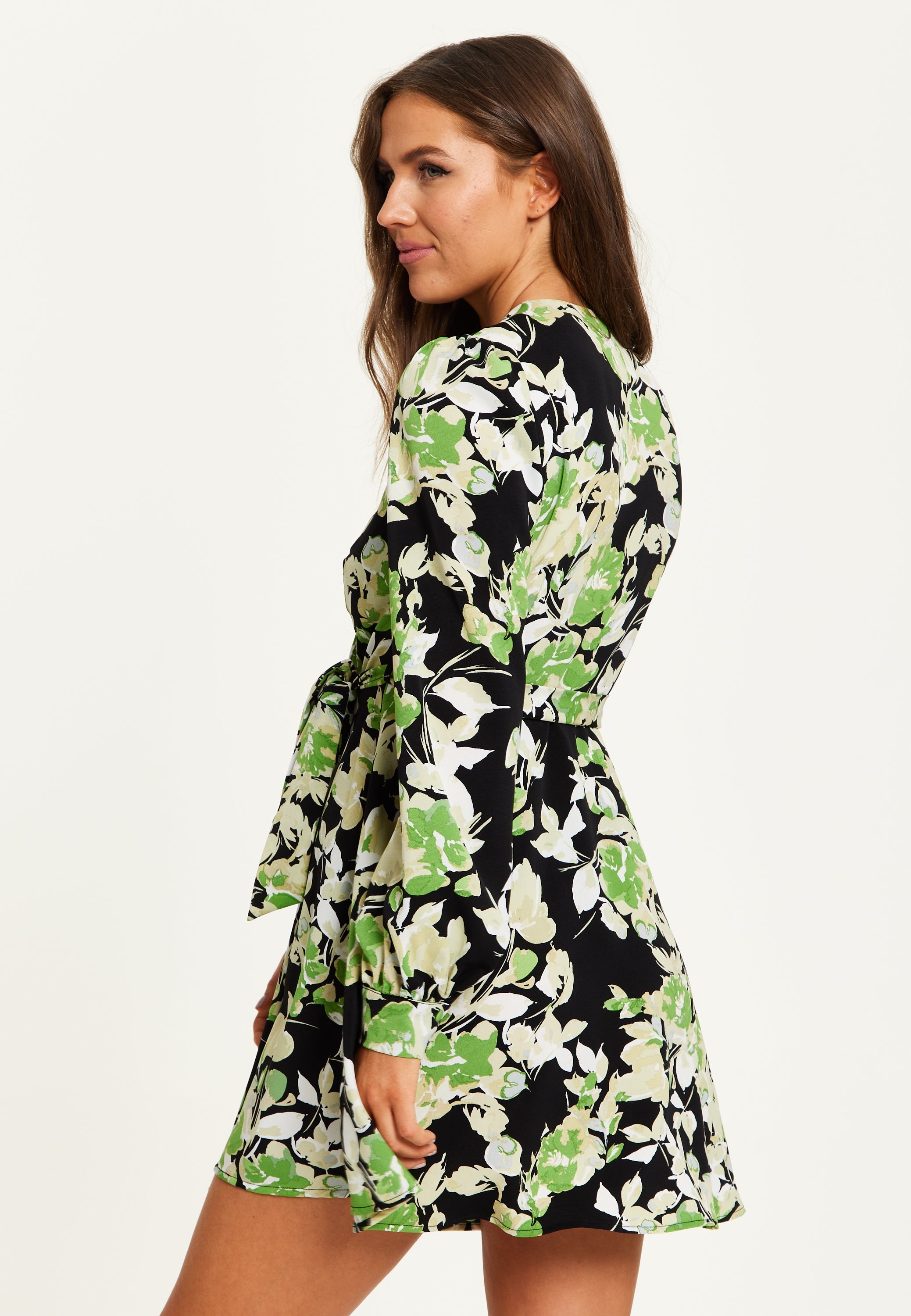 Women's Mini Dress in Black with Long Sleeves and Green Floral Print Wrap Style - Liquorish