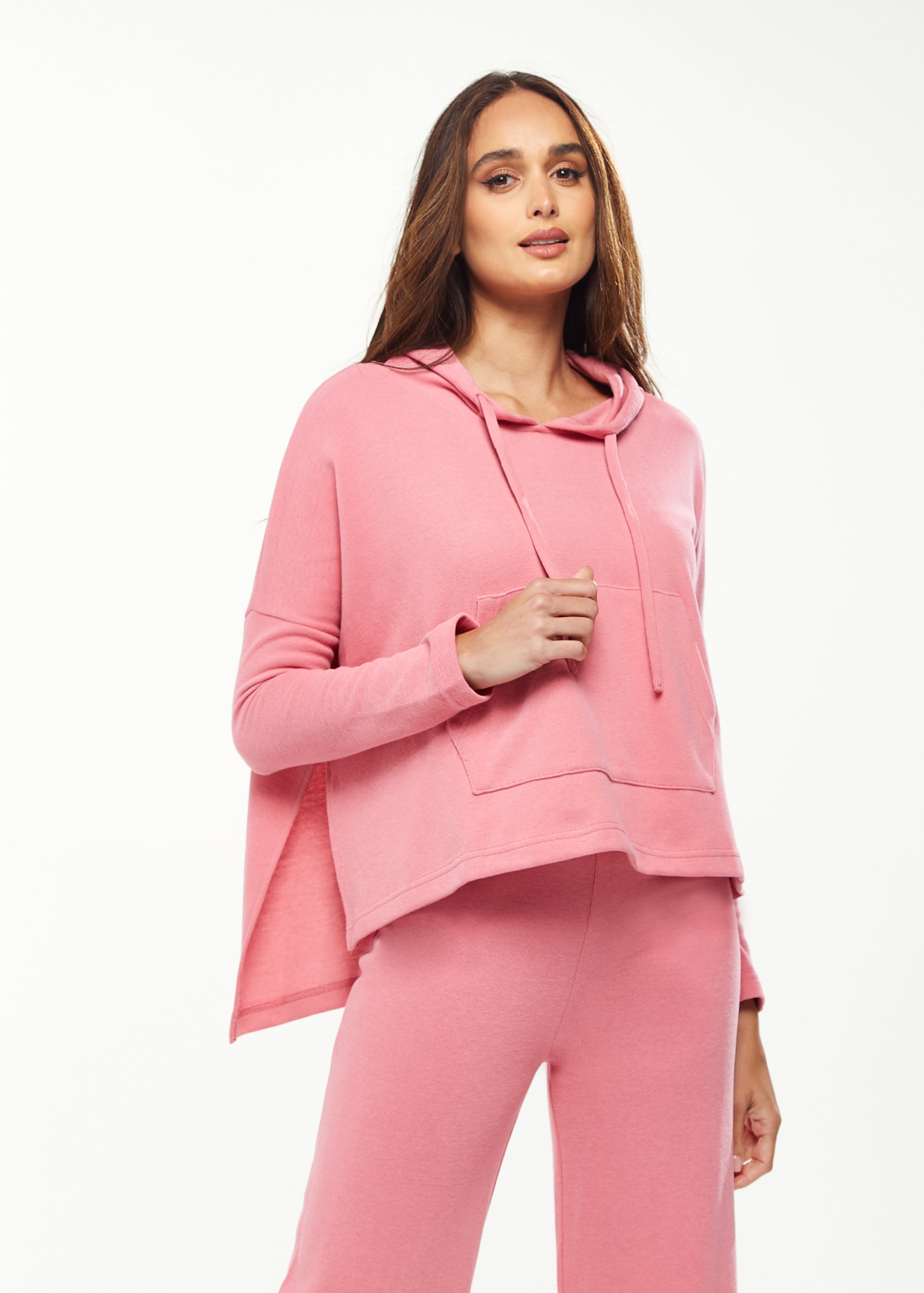 Women's Oversized Hooded Sweatshirt with Front Pocket in Pink - Stylish, Comfortable, with Side Slits and Adjustable Hood
