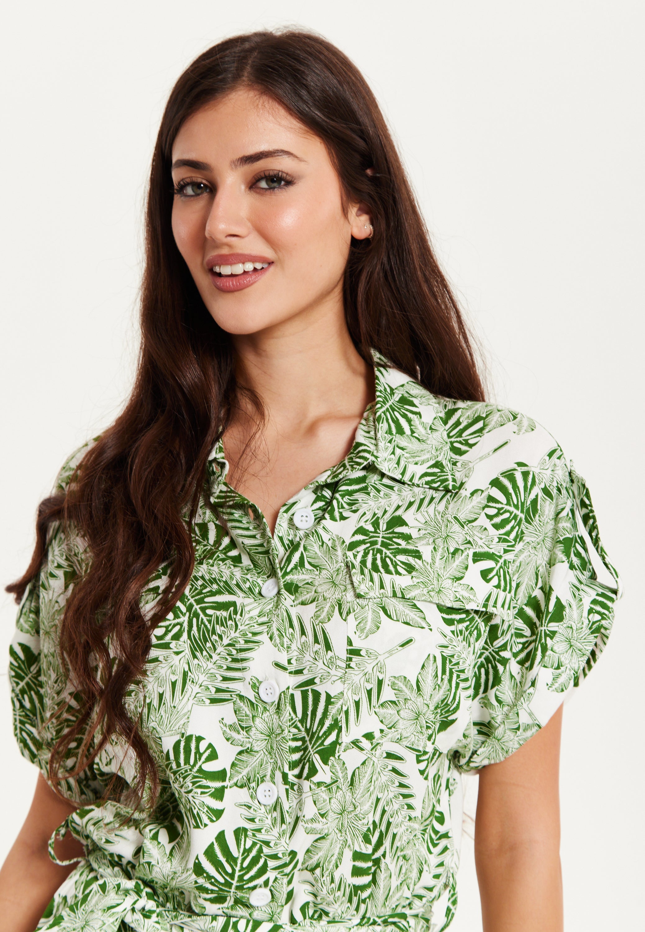 Women's Green Leaf Printed Loose Fit Jumpsuit with Tie Waist and Pocket Details - Liquorish