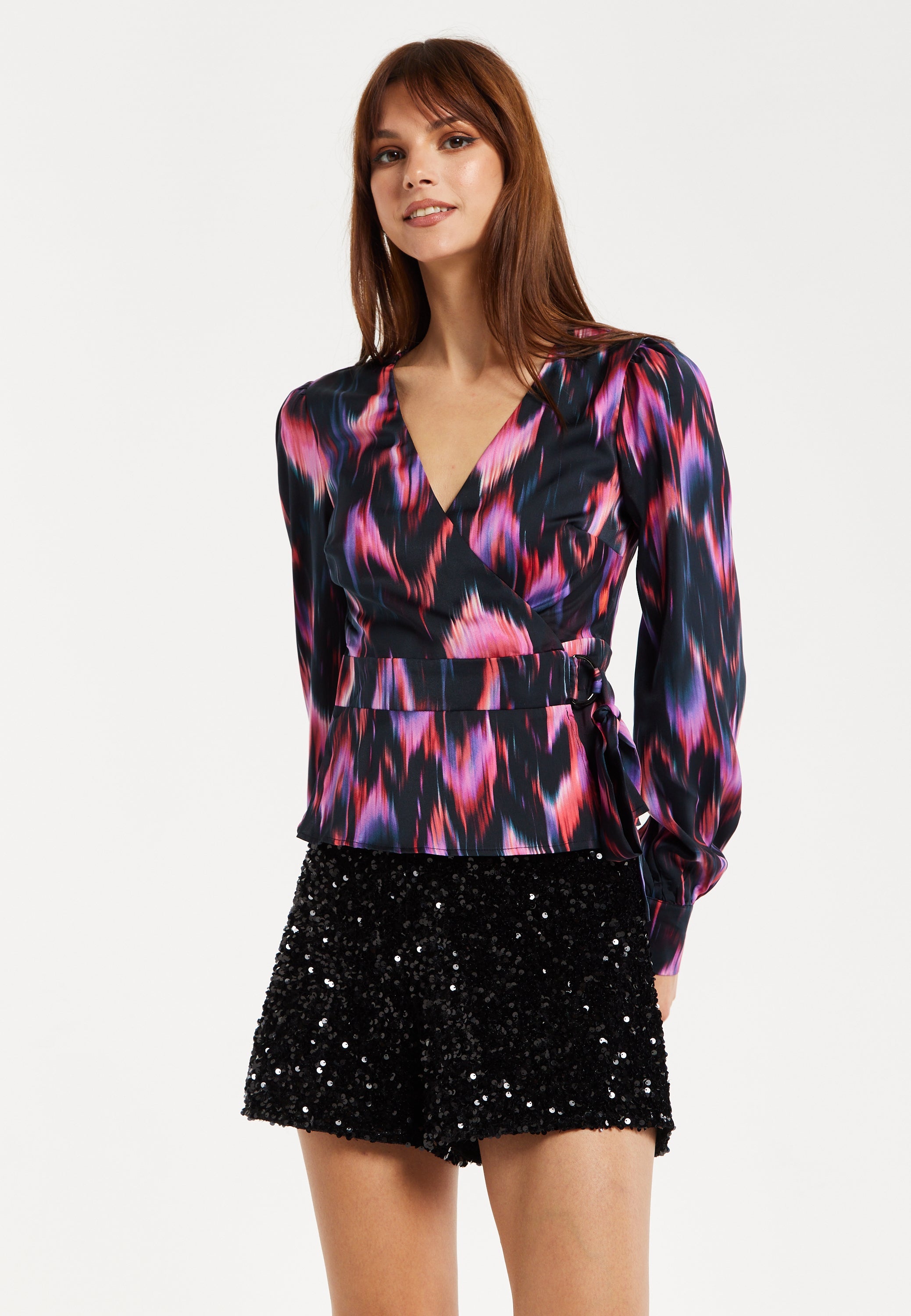 Women's Abstract Ikat Top in Black with Vibrant Feather Print, Long Balloon Sleeves, Button-Up High Neck Collar.