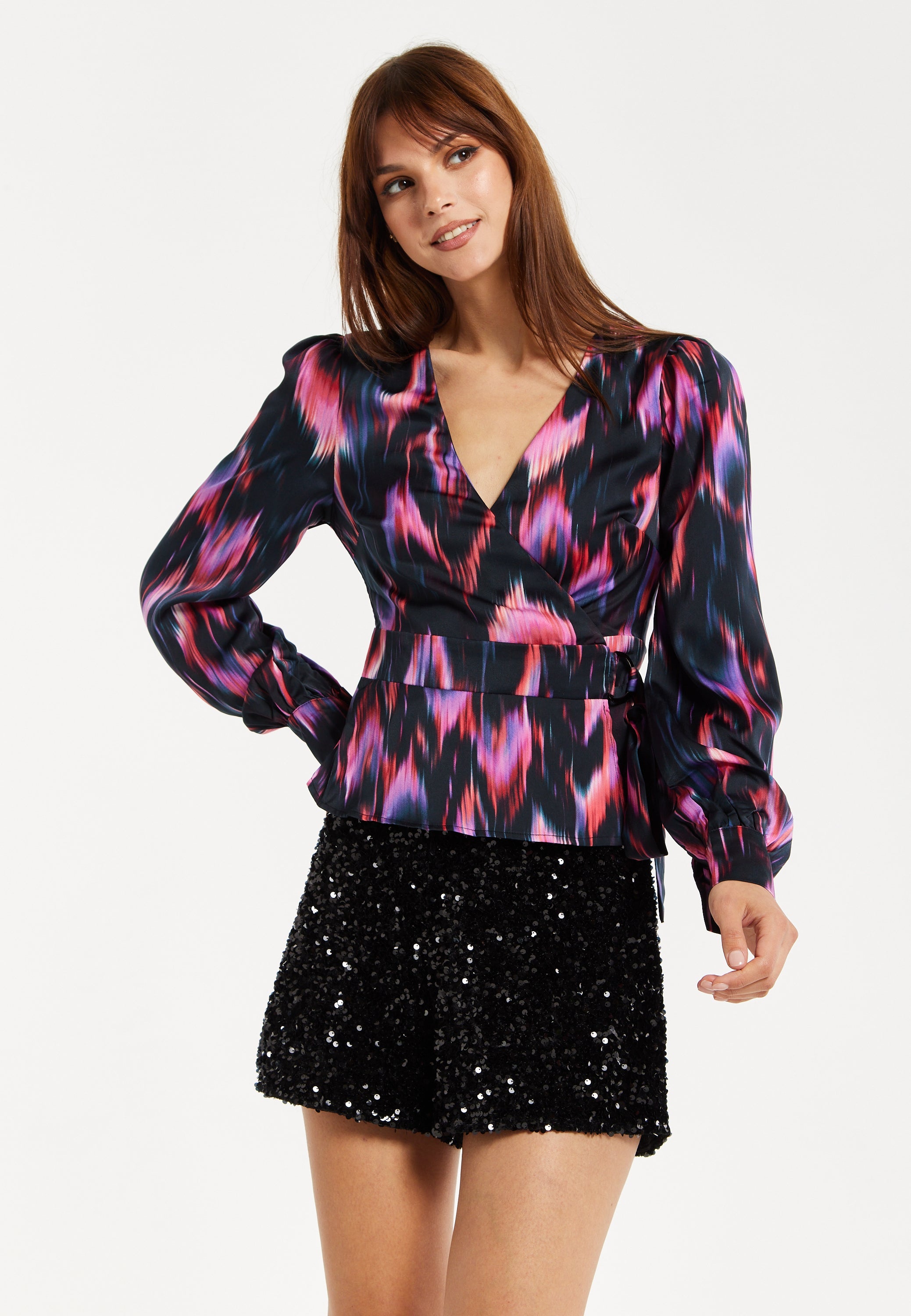Women's Abstract Ikat Top in Black with Vibrant Feather Print, Long Balloon Sleeves, Button-Up High Neck Collar.
