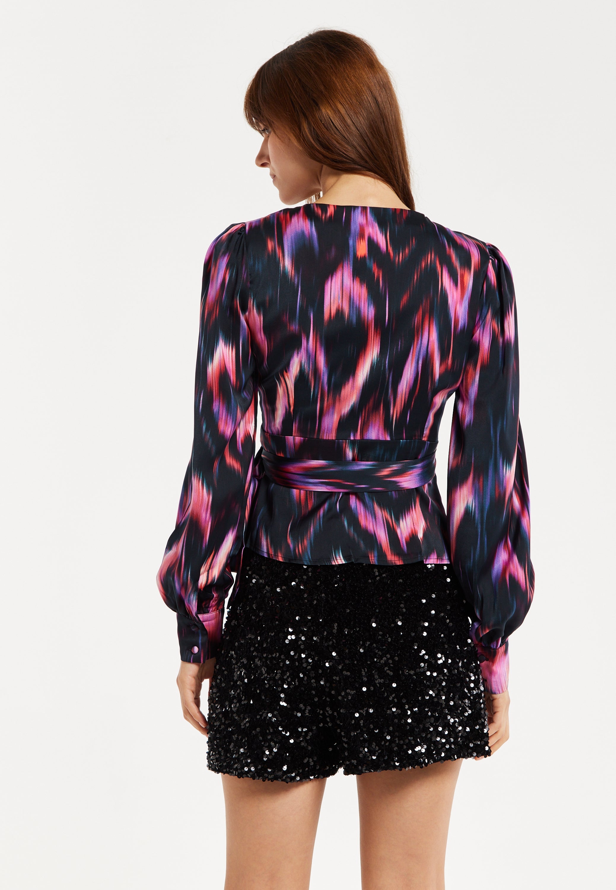 Women's Abstract Ikat Top in Black with Vibrant Feather Print, Long Balloon Sleeves, Button-Up High Neck Collar.