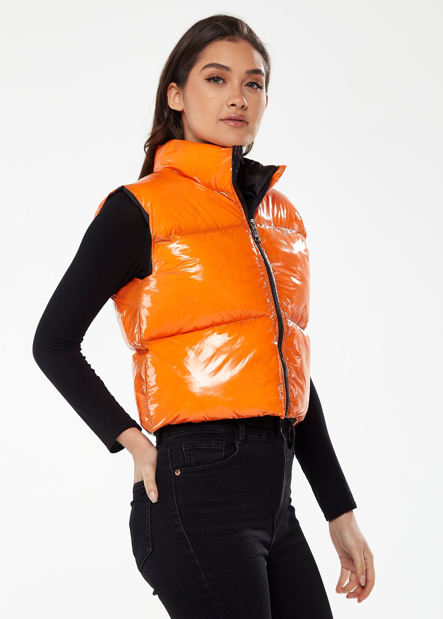 Women's Wet Look Gilet in Orange - Sleeveless, High Neck, Zip Closure, Cropped Fit, Regular Fit, Available in Classic and Bright Colours.