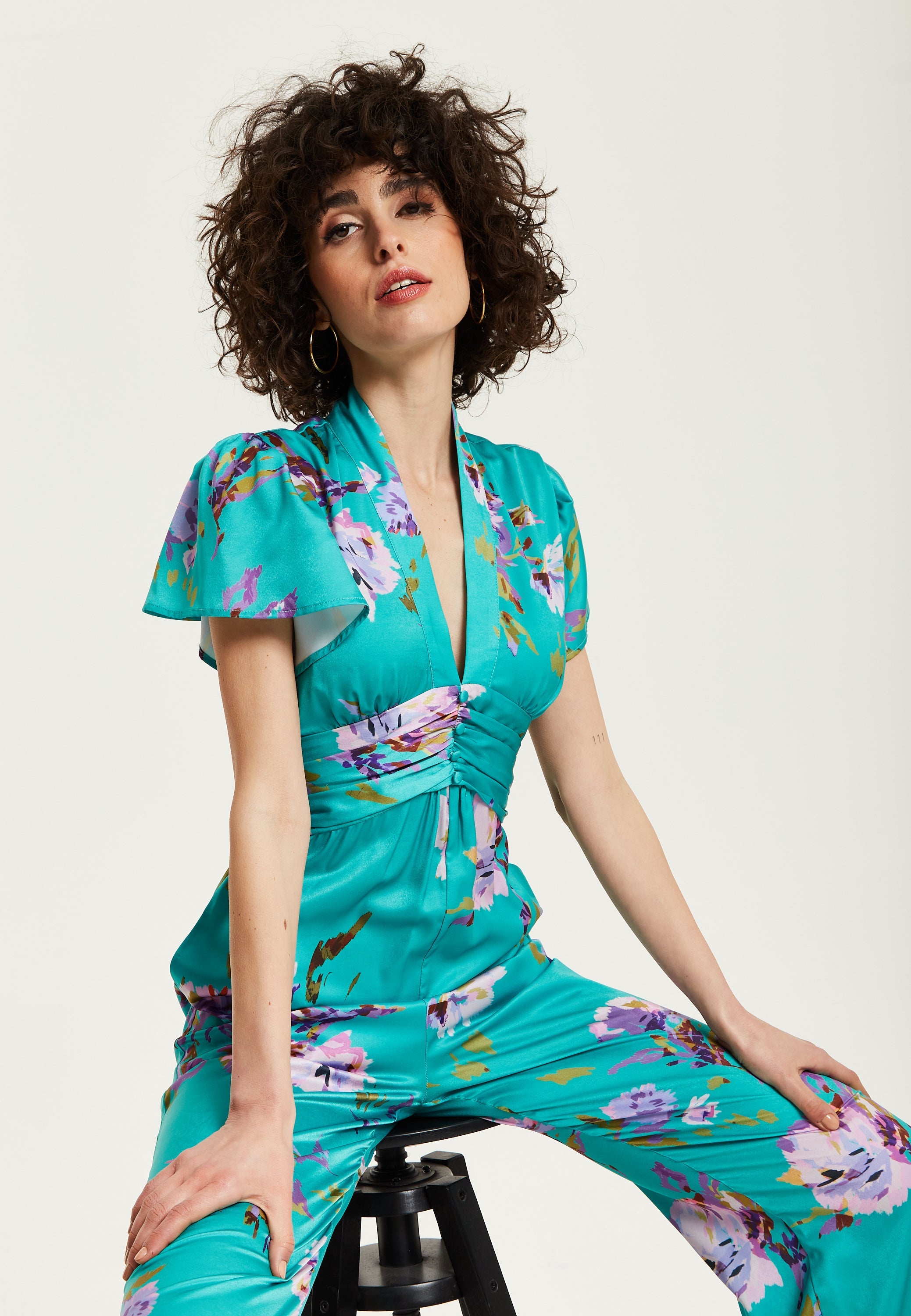 Women's Jumpsuit in Green Floral Print with Short Sleeves and V Neck - Regular Fit by Liquorish