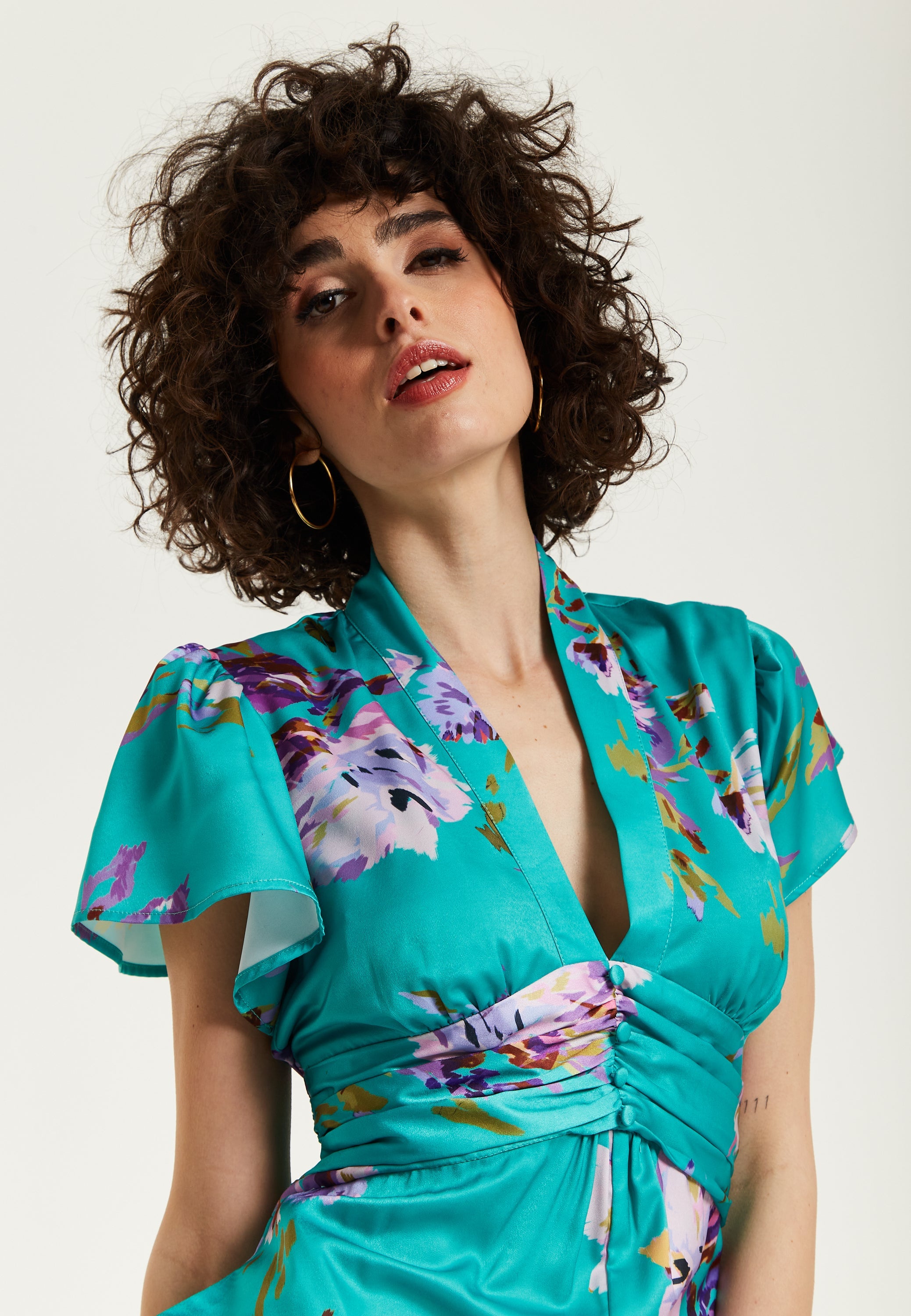 Women's Jumpsuit in Green Floral Print with Short Sleeves and V Neck - Regular Fit by Liquorish