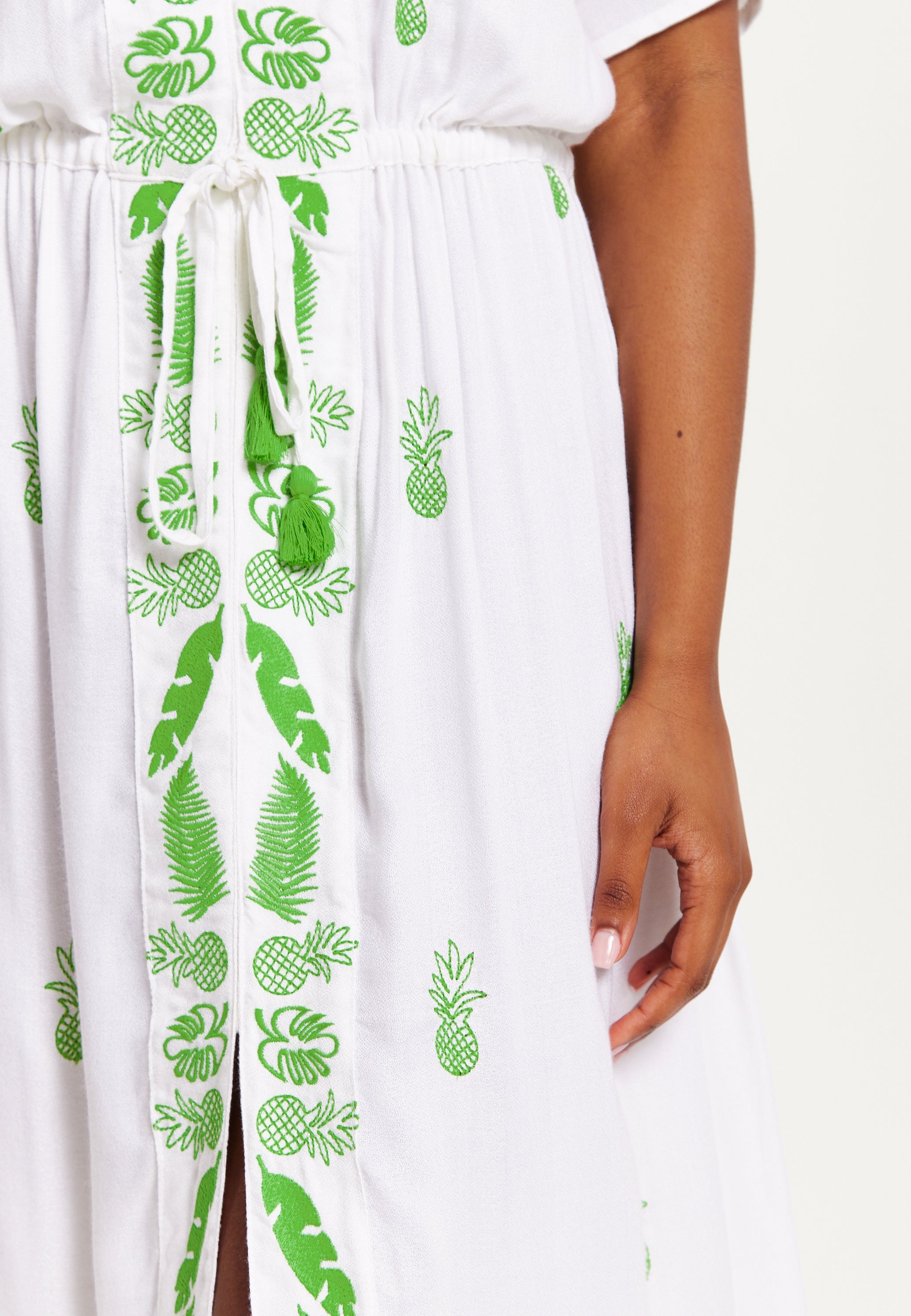 Women's Maxi Dress in White with Short Sleeves and Front Slit, Featuring Green Pineapple Embroidery - Liquorish