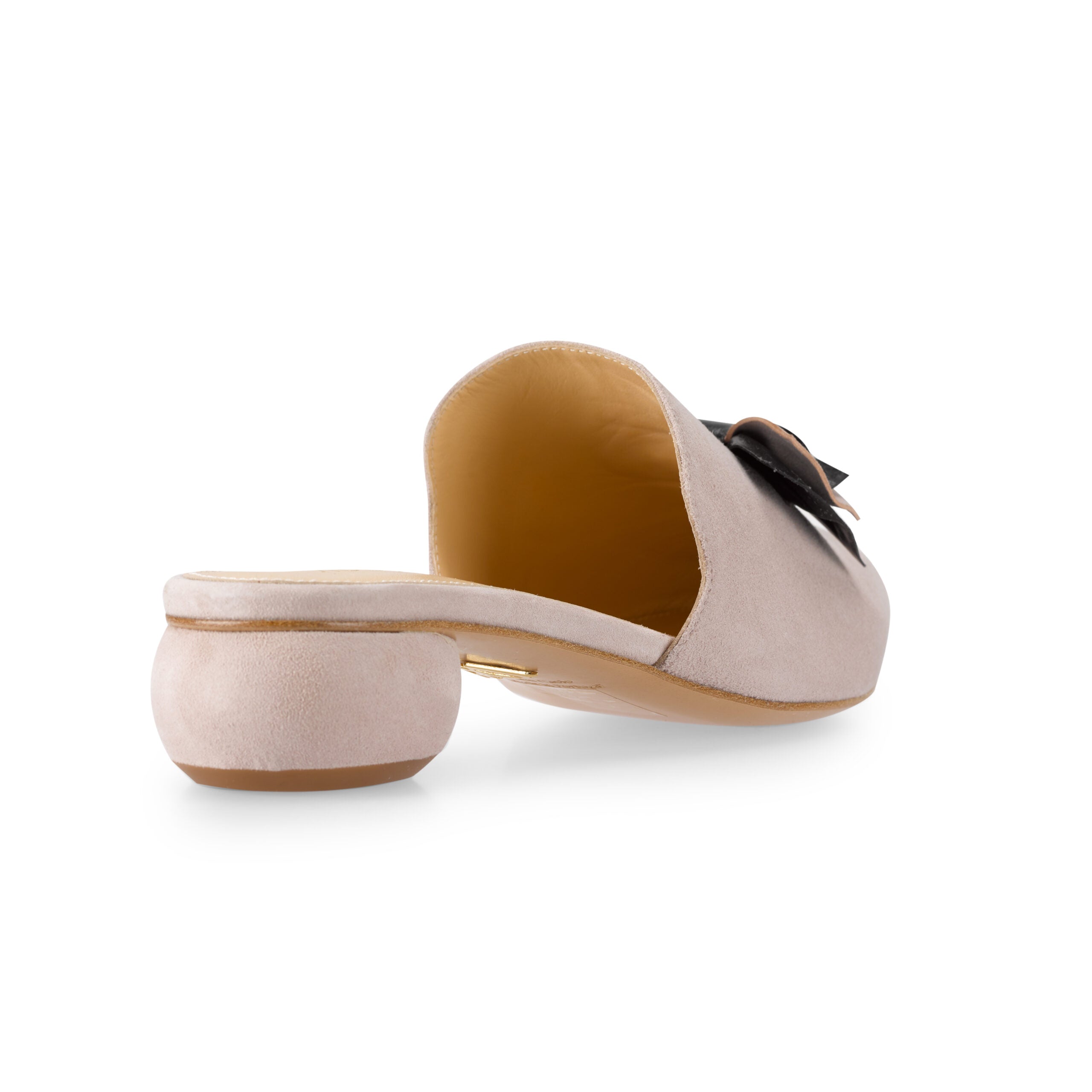 Our rocaille mule will add a sophisticated comfort to any outfit.