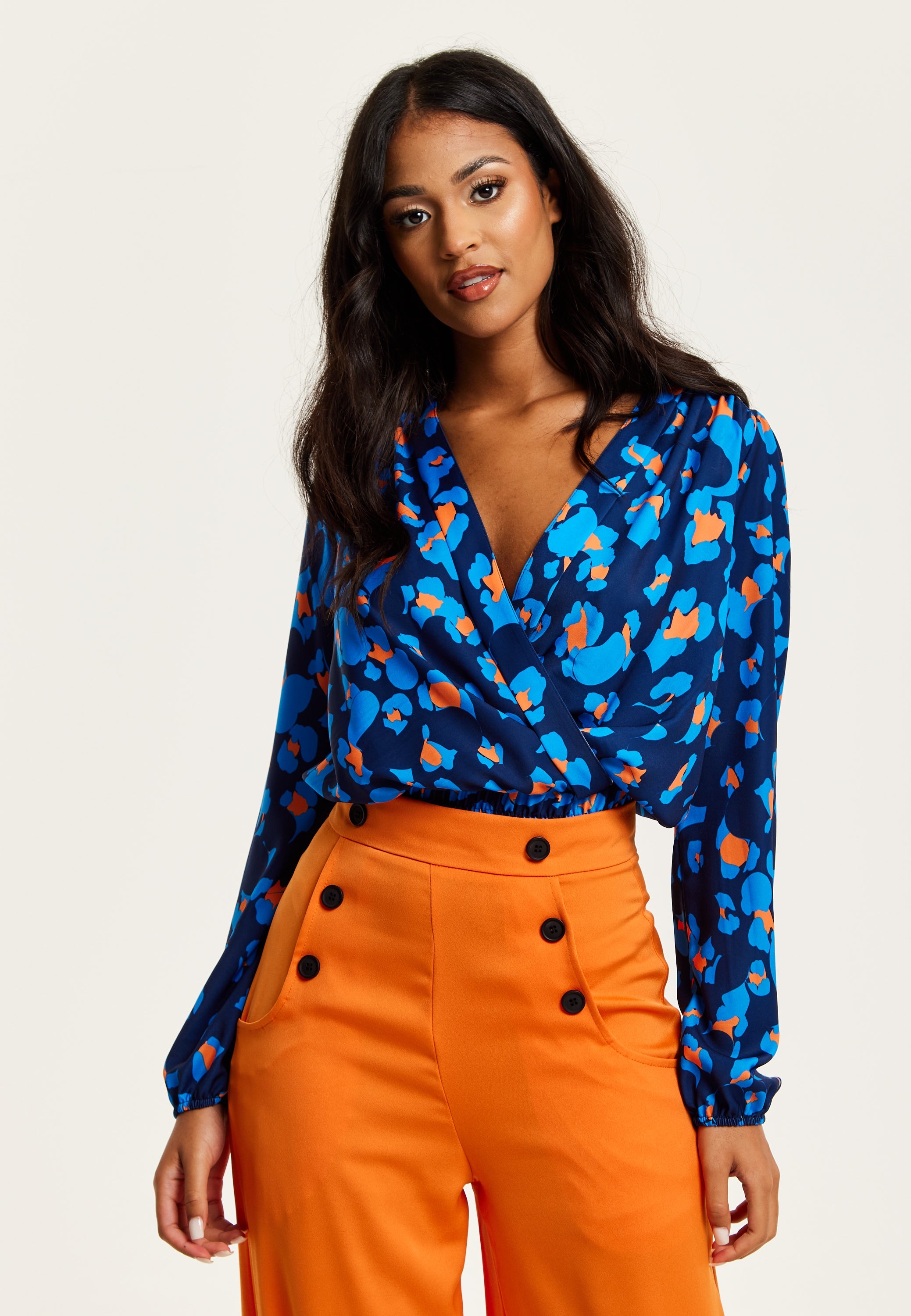 Women's Abstract Print Wrap Top In Pink, Orange, And Blue - Crossover Front, V Neck, Long Sleeves, Elasticated Waist