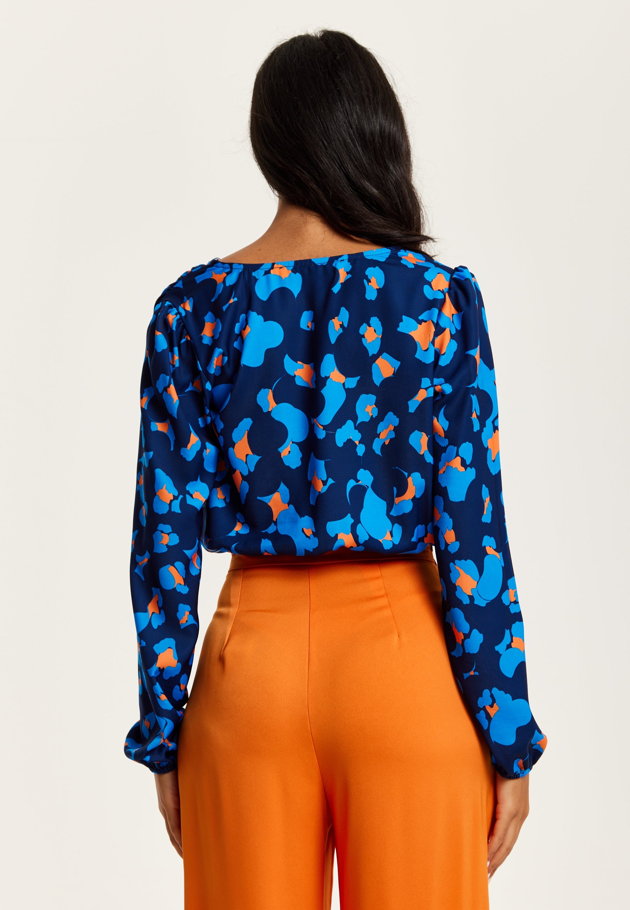 Women's Abstract Print Wrap Top In Pink, Orange, And Blue - Crossover Front, V Neck, Long Sleeves, Elasticated Waist