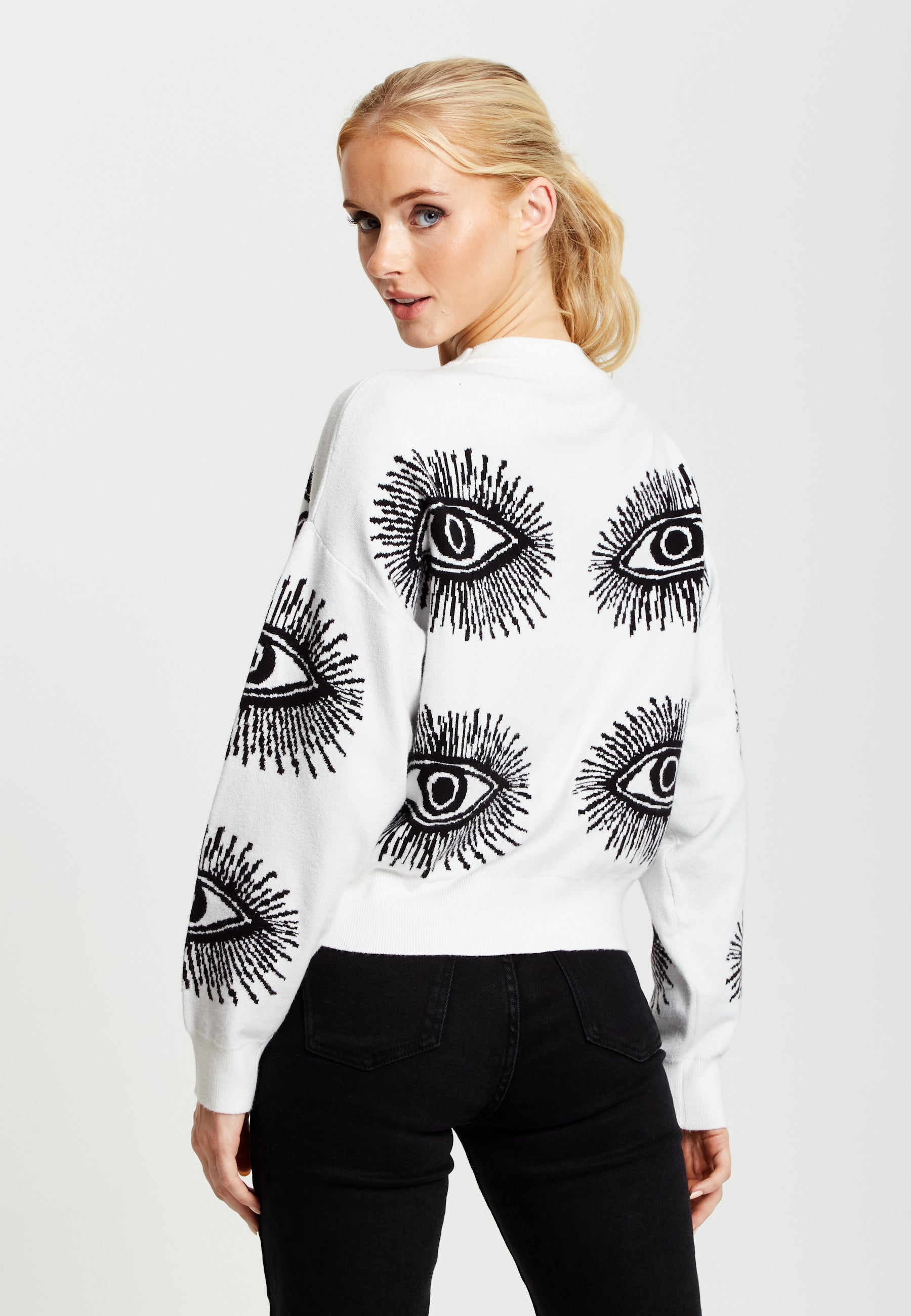 Women's Jumper in White with Long Sleeves and Distinctive Eye Pattern by Liquorish