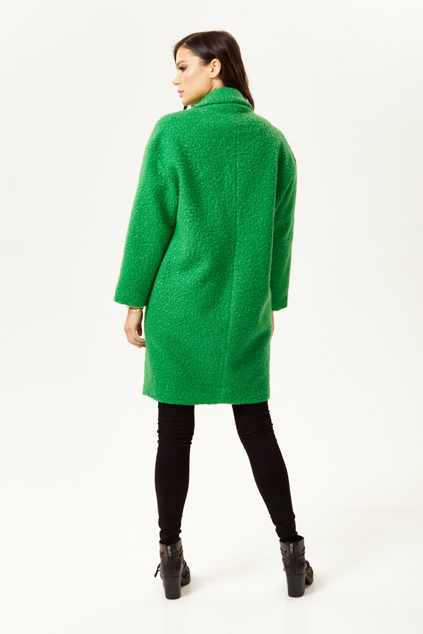 Discover online dress stores featuring a women’s fluffy green bouclé coat for standout winter style. Shop Now!