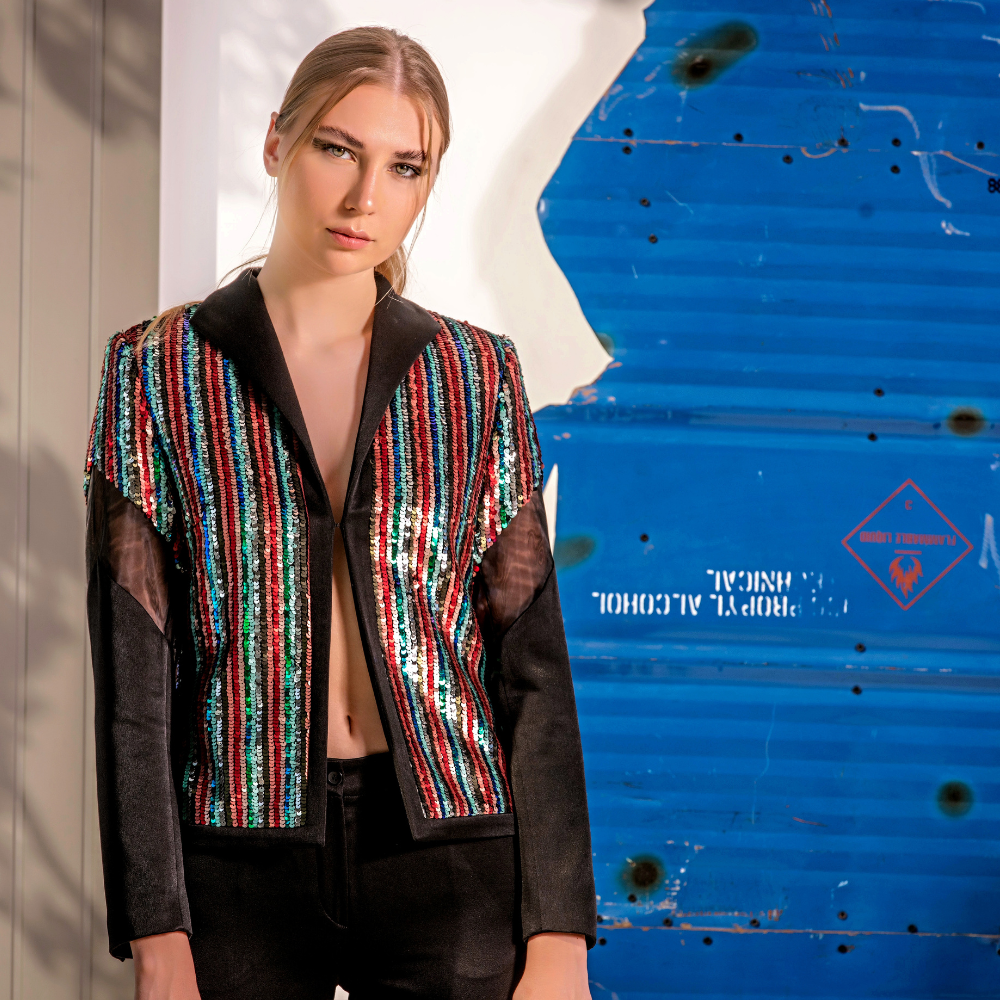 Black crepe Blazer in multi-colored sequins and black pants.