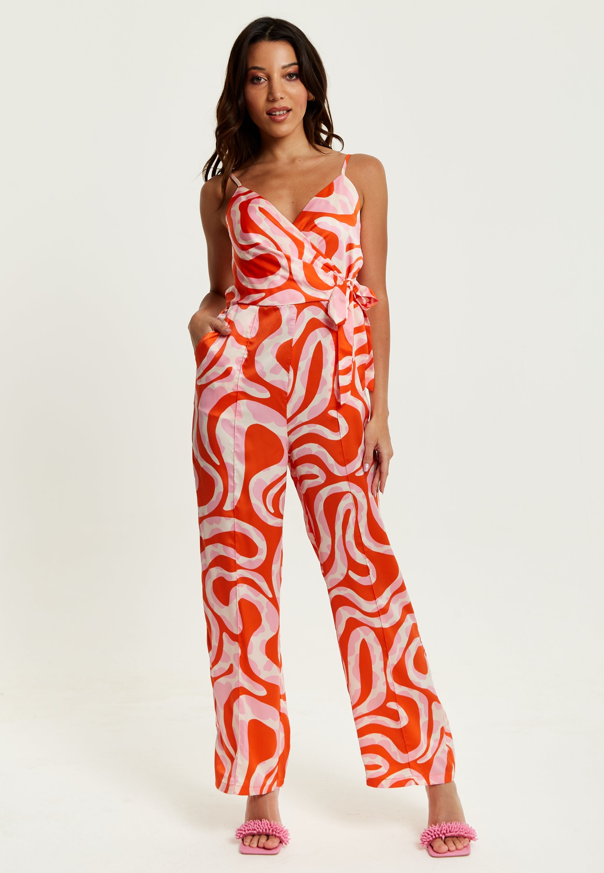 Women's Jumpsuit in Pink and Red Abstract Print with V Neck, Crossover Front, Tie Waist, Wide Legs - Liquorish