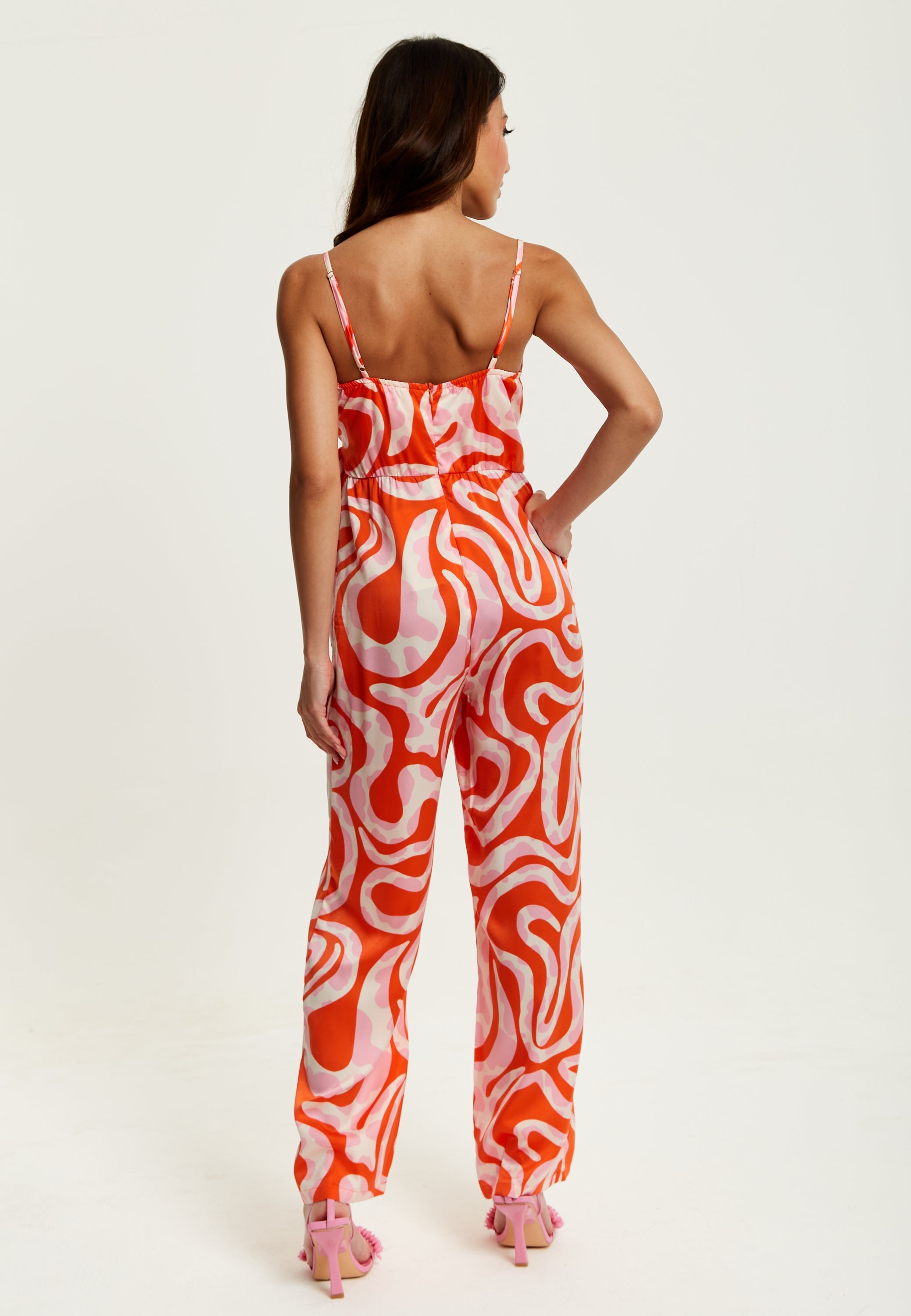 Women's Jumpsuit in Pink and Red Abstract Print with V Neck, Crossover Front, Tie Waist, Wide Legs - Liquorish