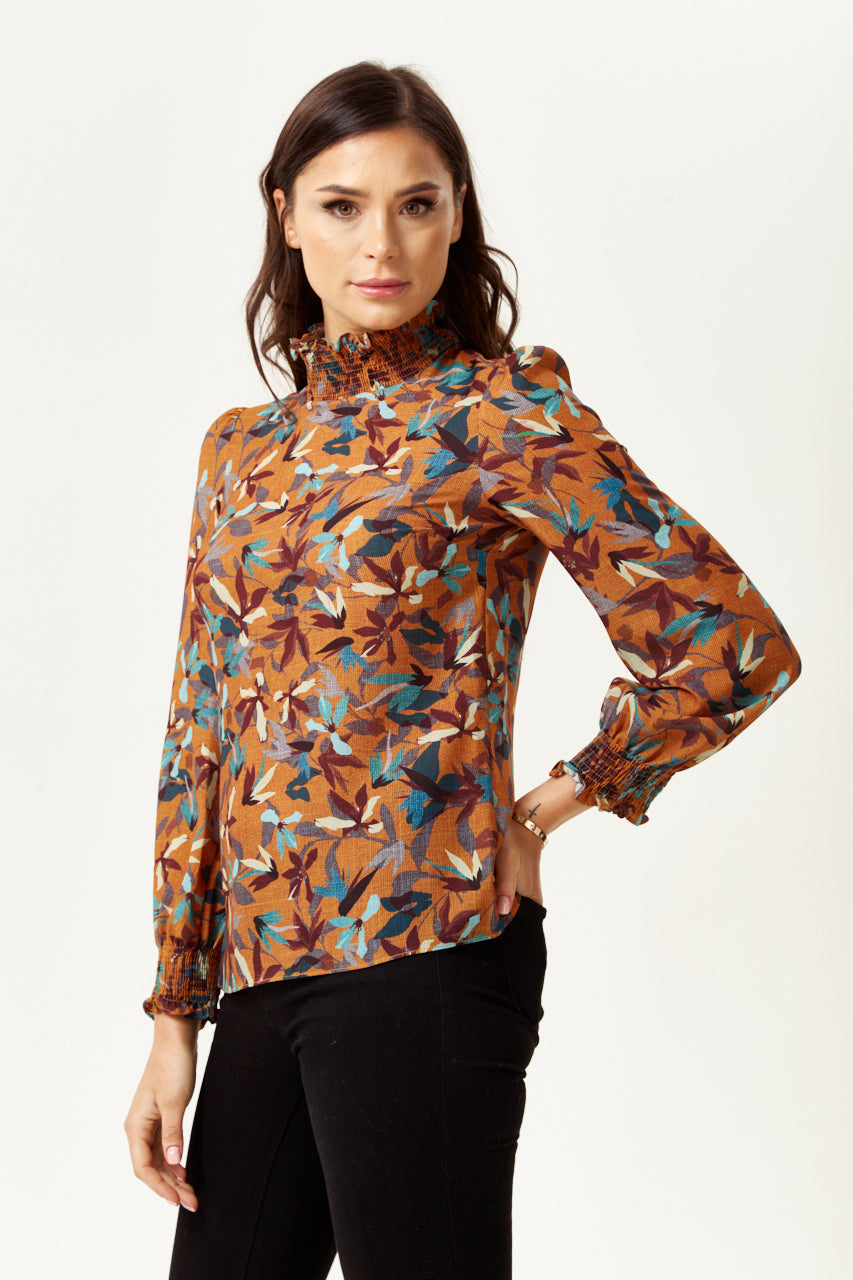 Explore womens wear featuring the elegant Divine Grace Long Sleeve Floral Print Top. Shop Now!