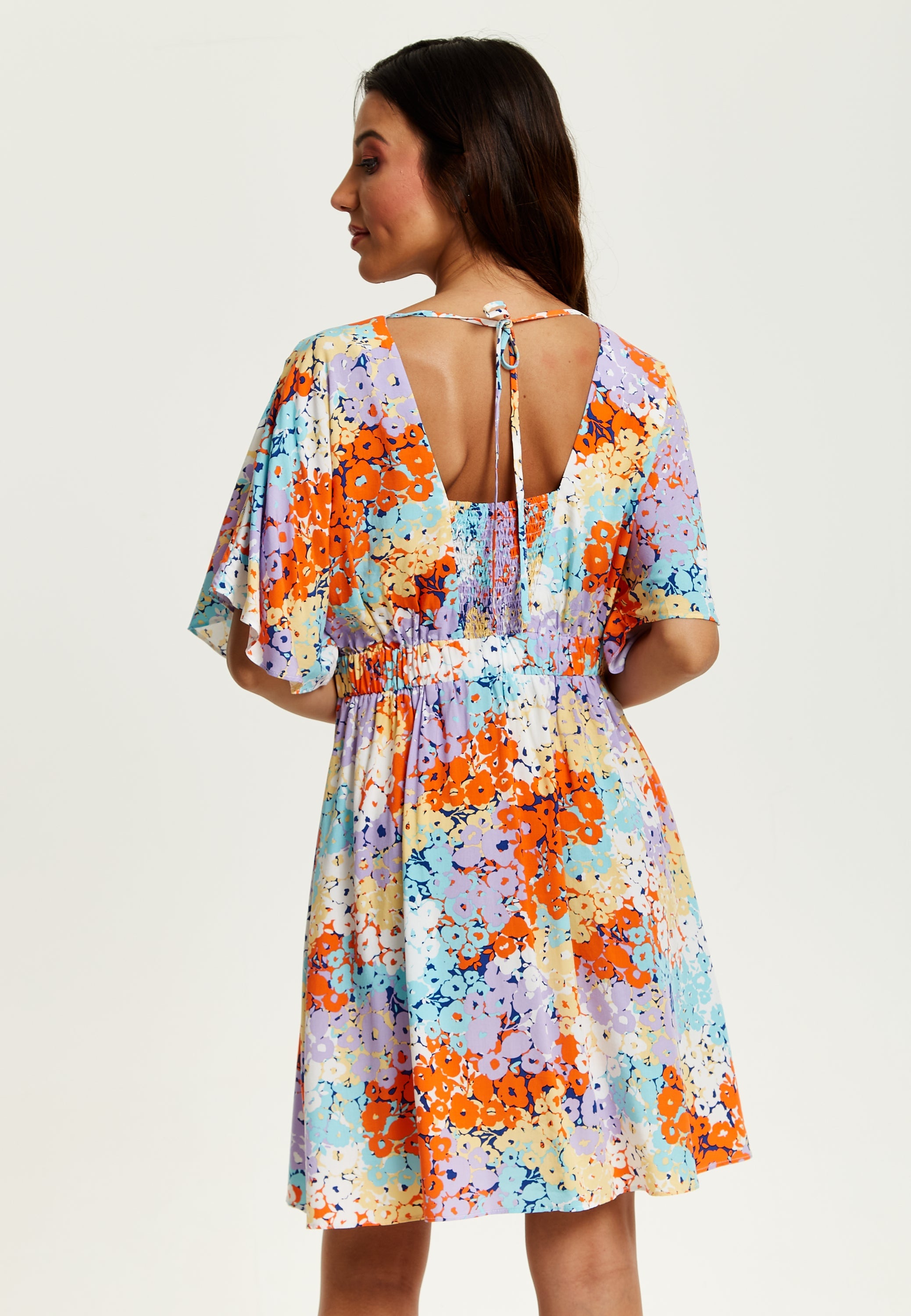 Women's Mini Dress with Open Back and Elasticated Waist in Multicolour Floral Print - Liquorish