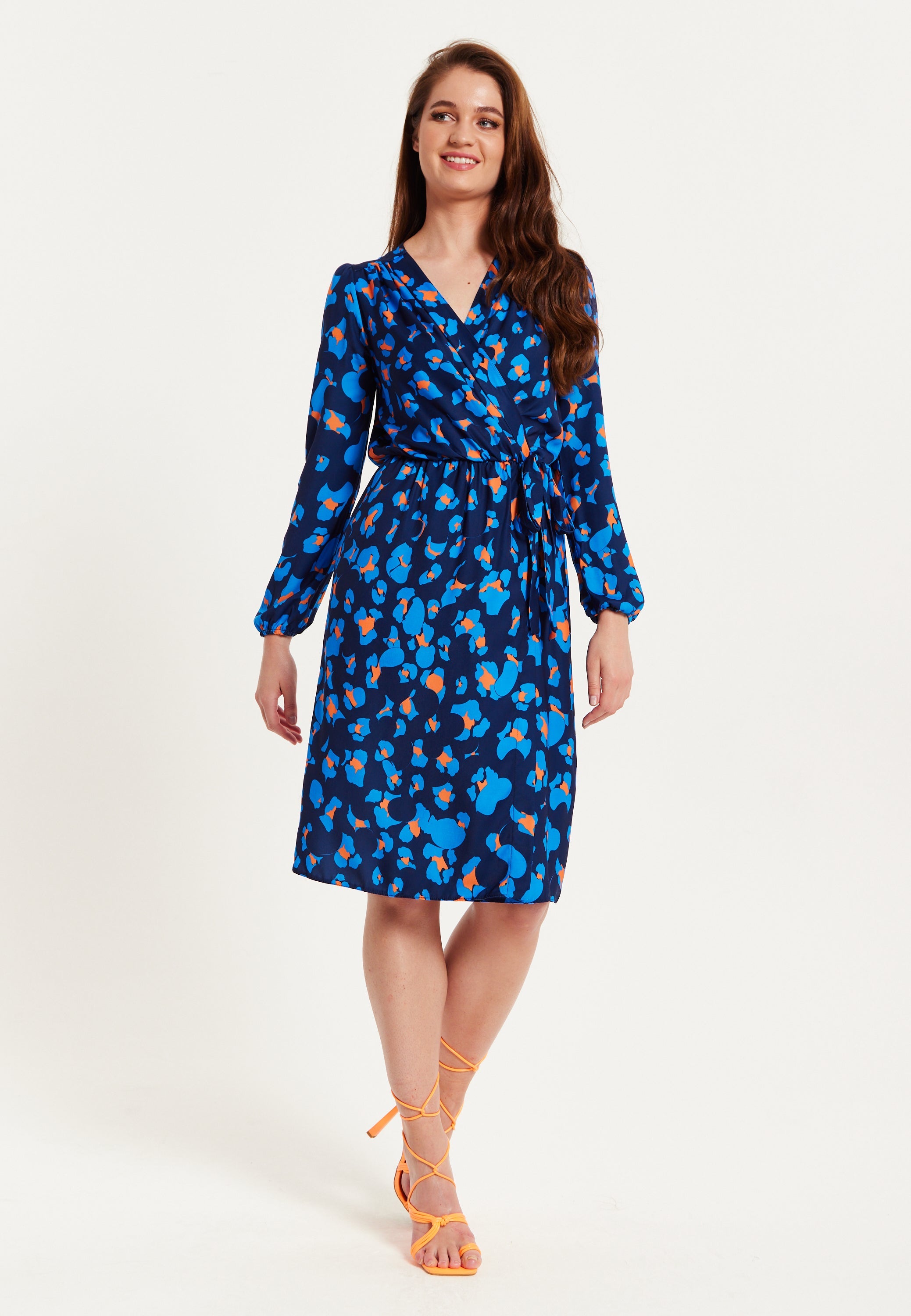 Women's Midi Wrap Dress in Blue with Long Sleeves - Elegant Abstract Print Design by Liquorish