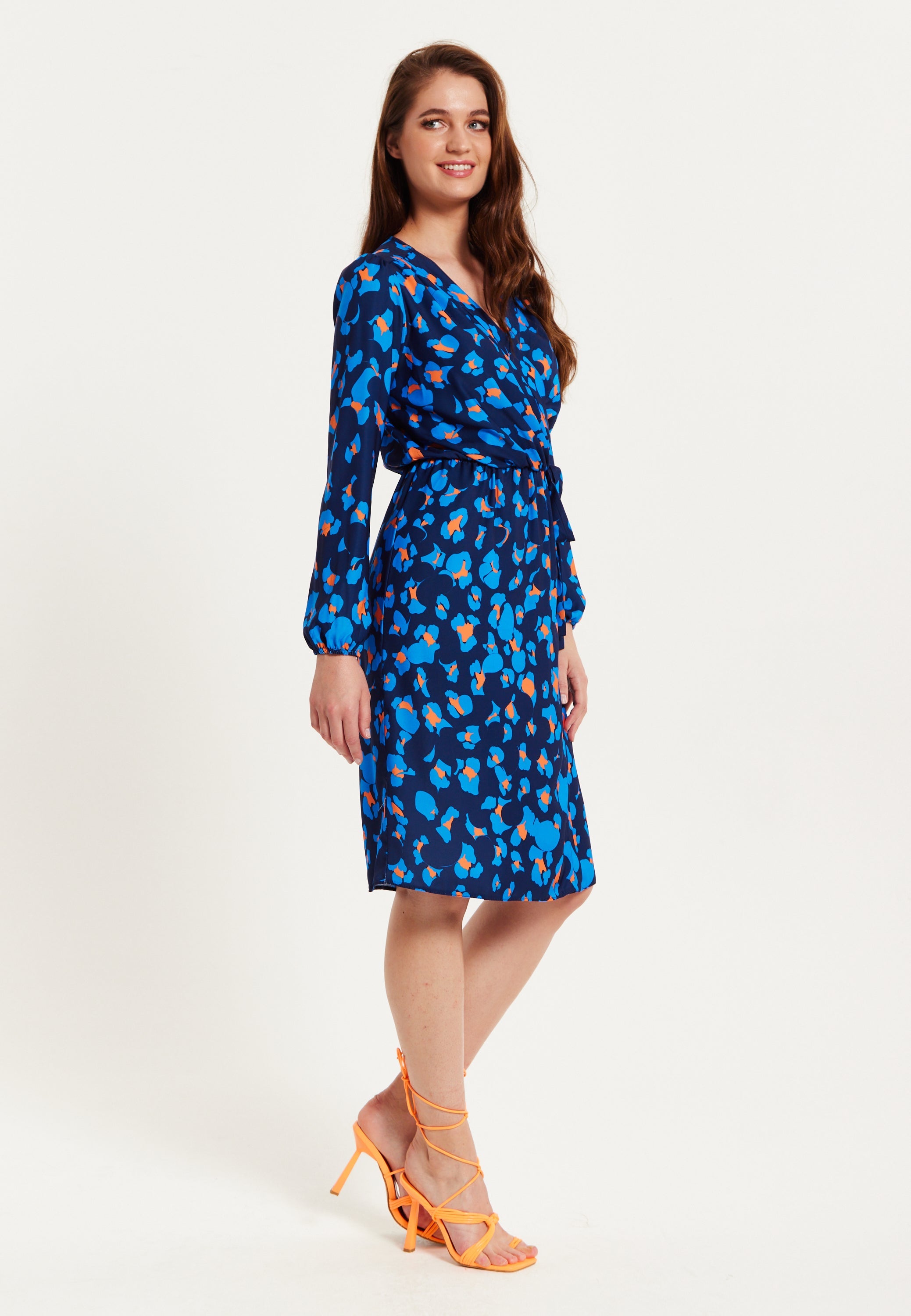 Women's Midi Wrap Dress in Blue with Long Sleeves - Elegant Abstract Print Design by Liquorish