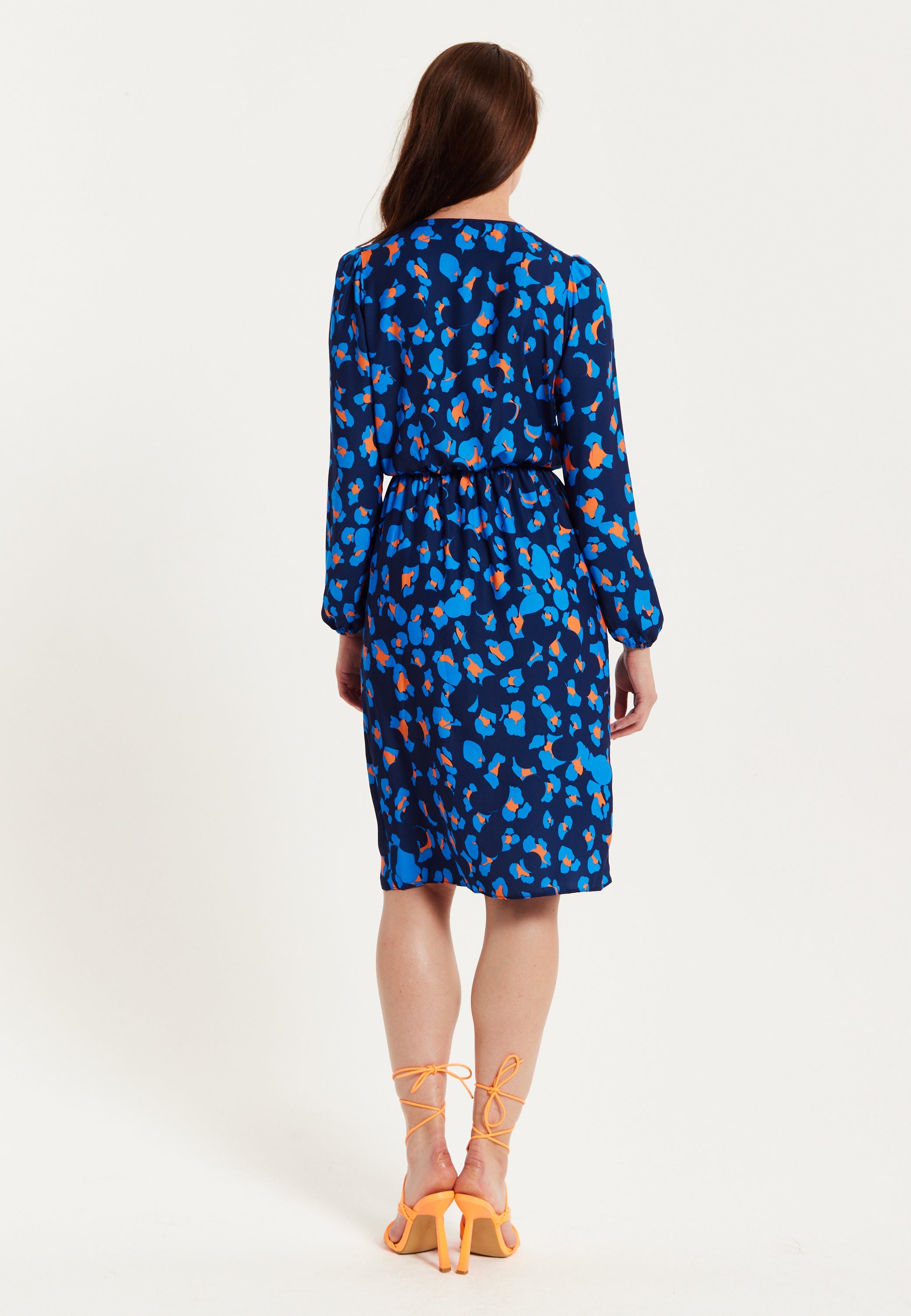Women's Midi Wrap Dress in Blue with Long Sleeves - Elegant Abstract Print Design by Liquorish