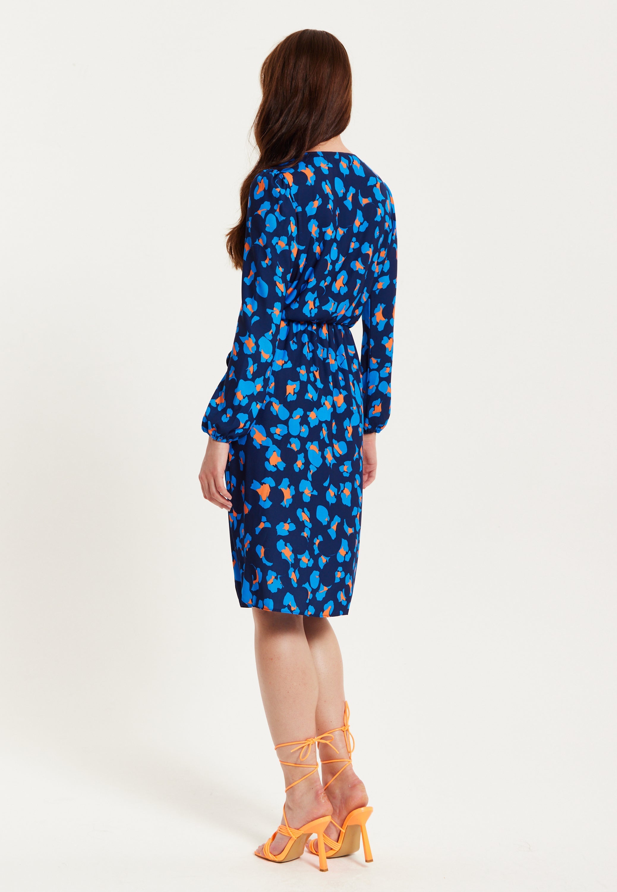 Women's Midi Wrap Dress in Blue with Long Sleeves - Elegant Abstract Print Design by Liquorish