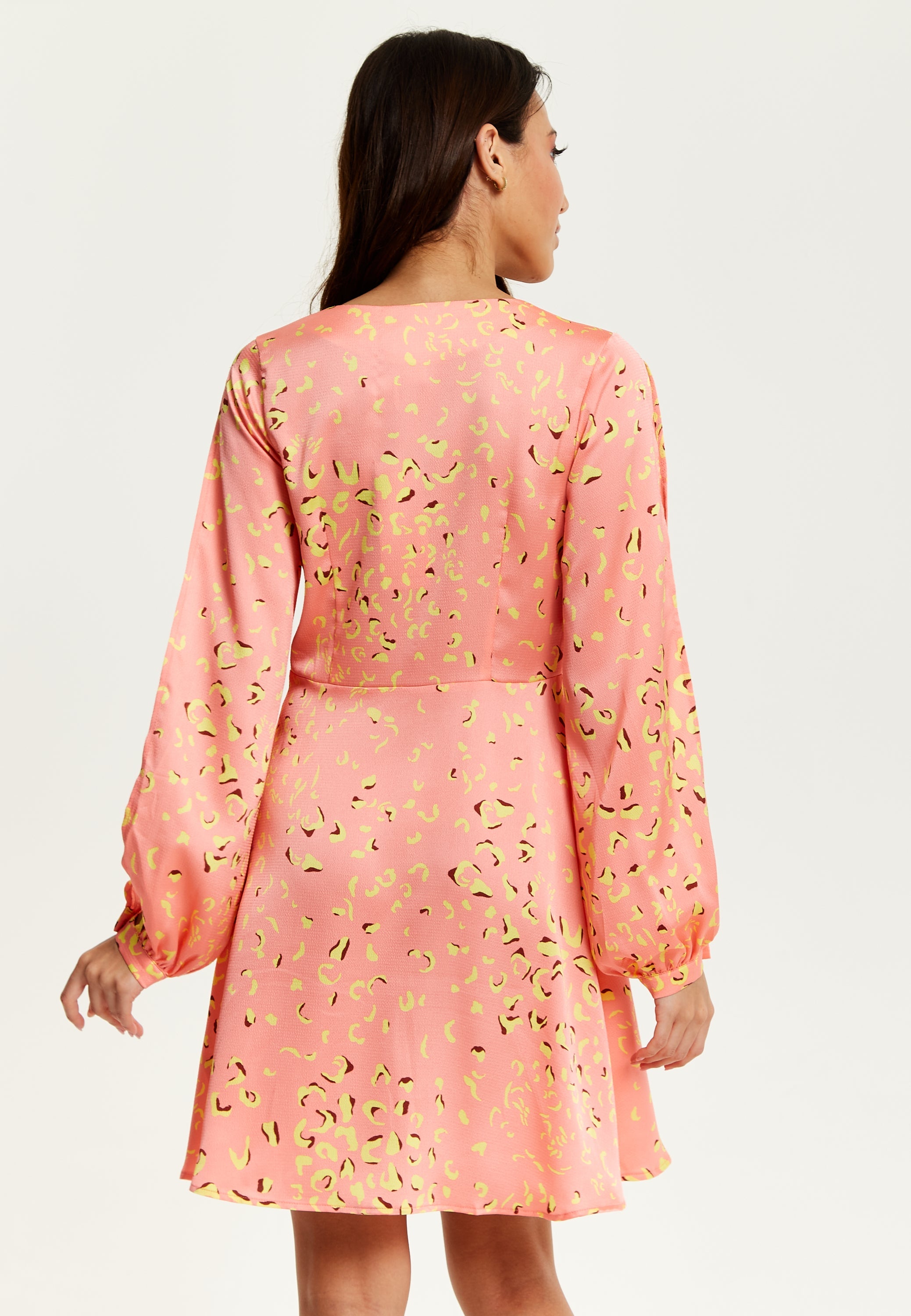 Women's Mini Dress in Peach with Slit Sleeves and Abstract Animal Print - Effortless Style by Liquorish