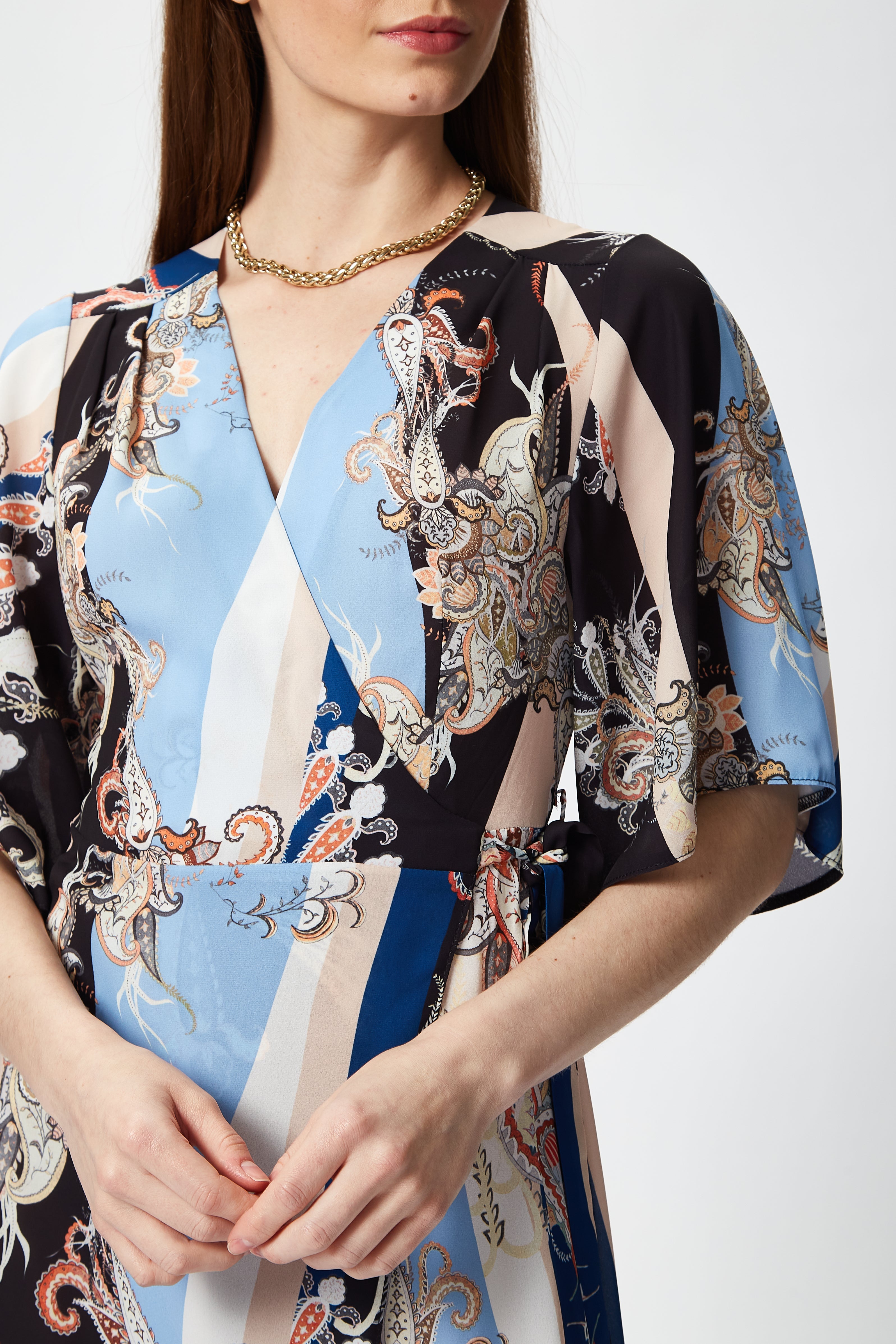 Shop women's clothing dresses including the elegant Women's Midi Wrap Dress. Shop Now!