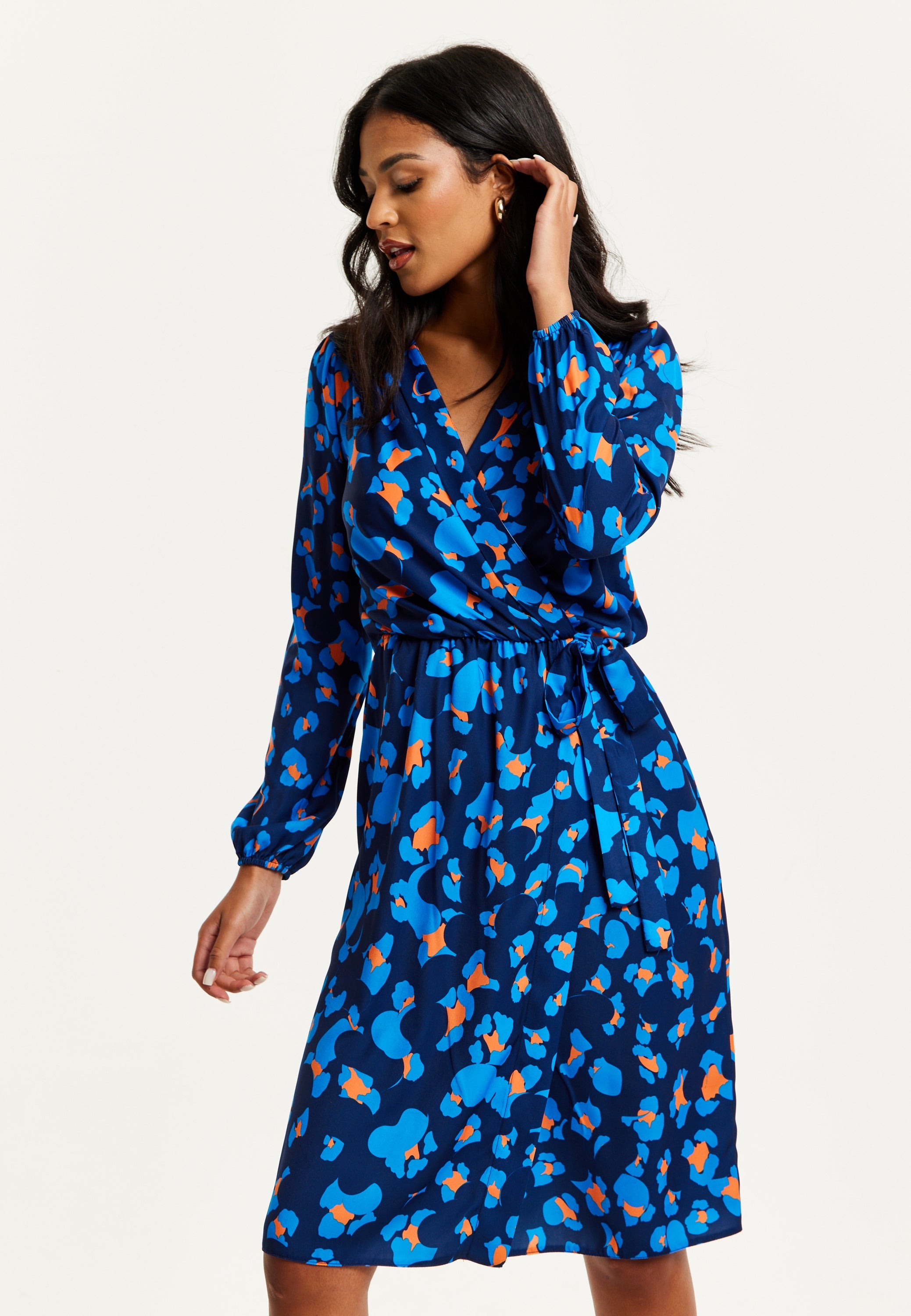Women's Midi Wrap Dress in Blue with Long Sleeves - Elegant Abstract Print Design by Liquorish