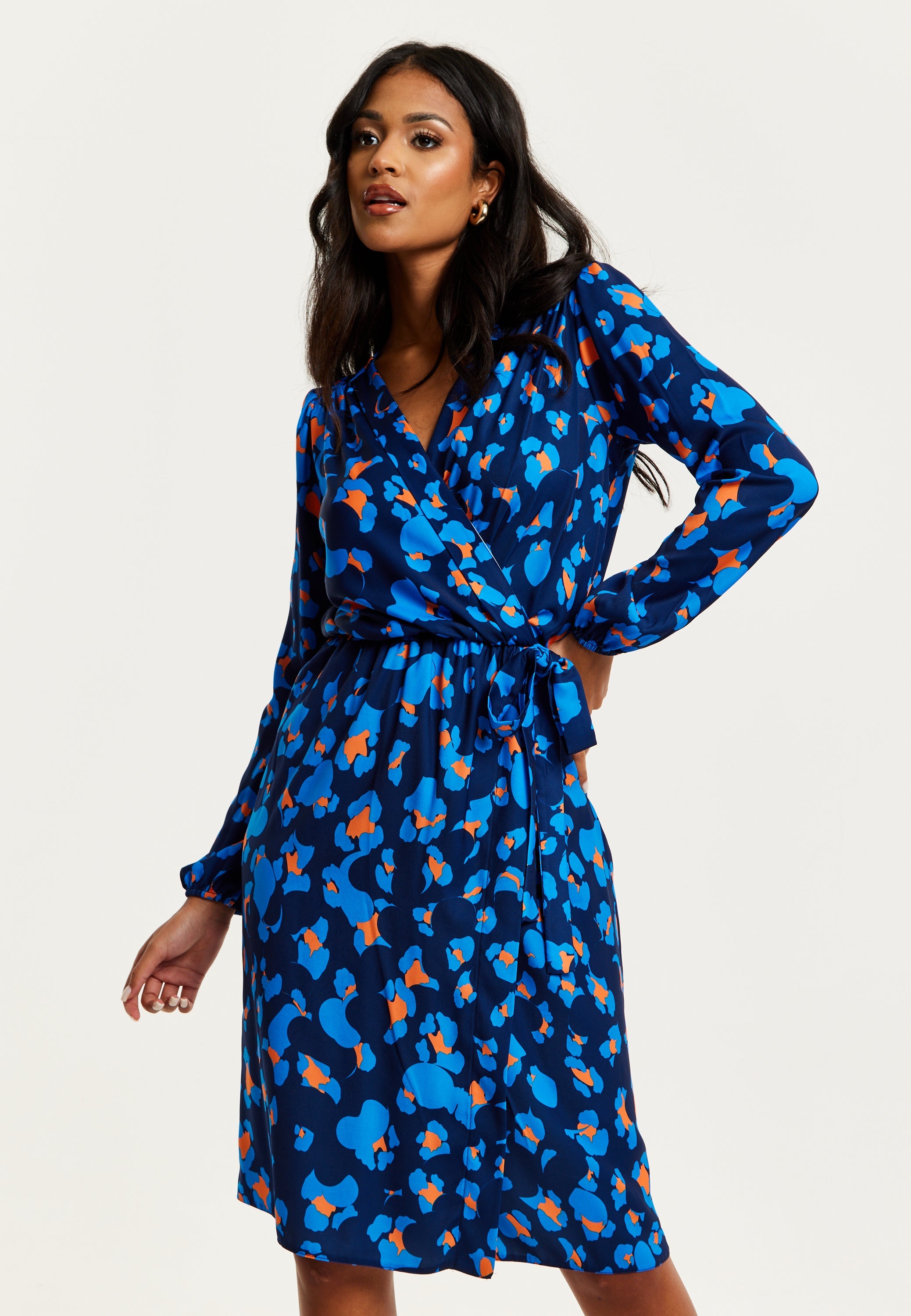 Women's Midi Wrap Dress in Blue with Long Sleeves - Elegant Abstract Print Design by Liquorish