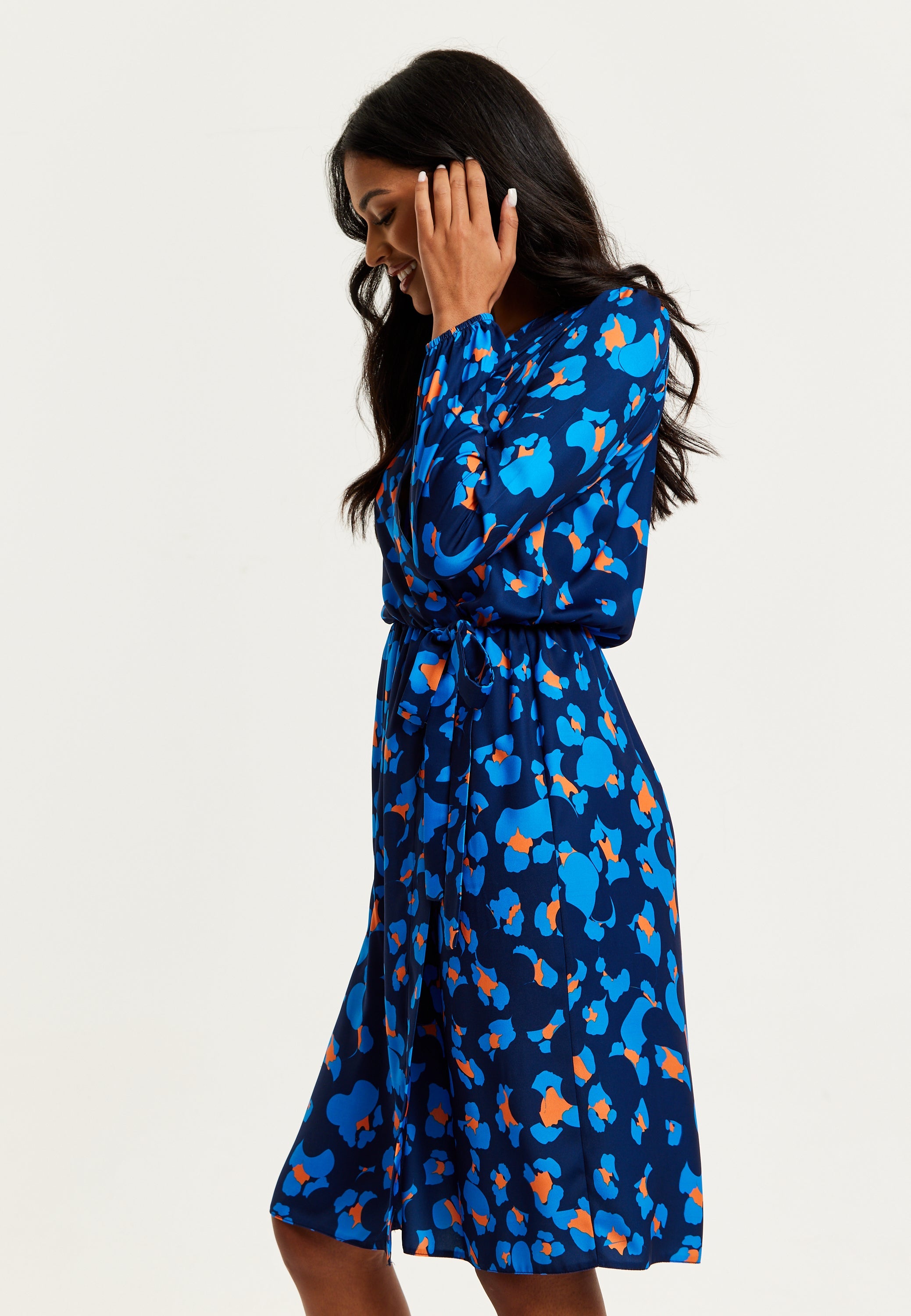 Women's Midi Wrap Dress in Blue with Long Sleeves - Elegant Abstract Print Design by Liquorish