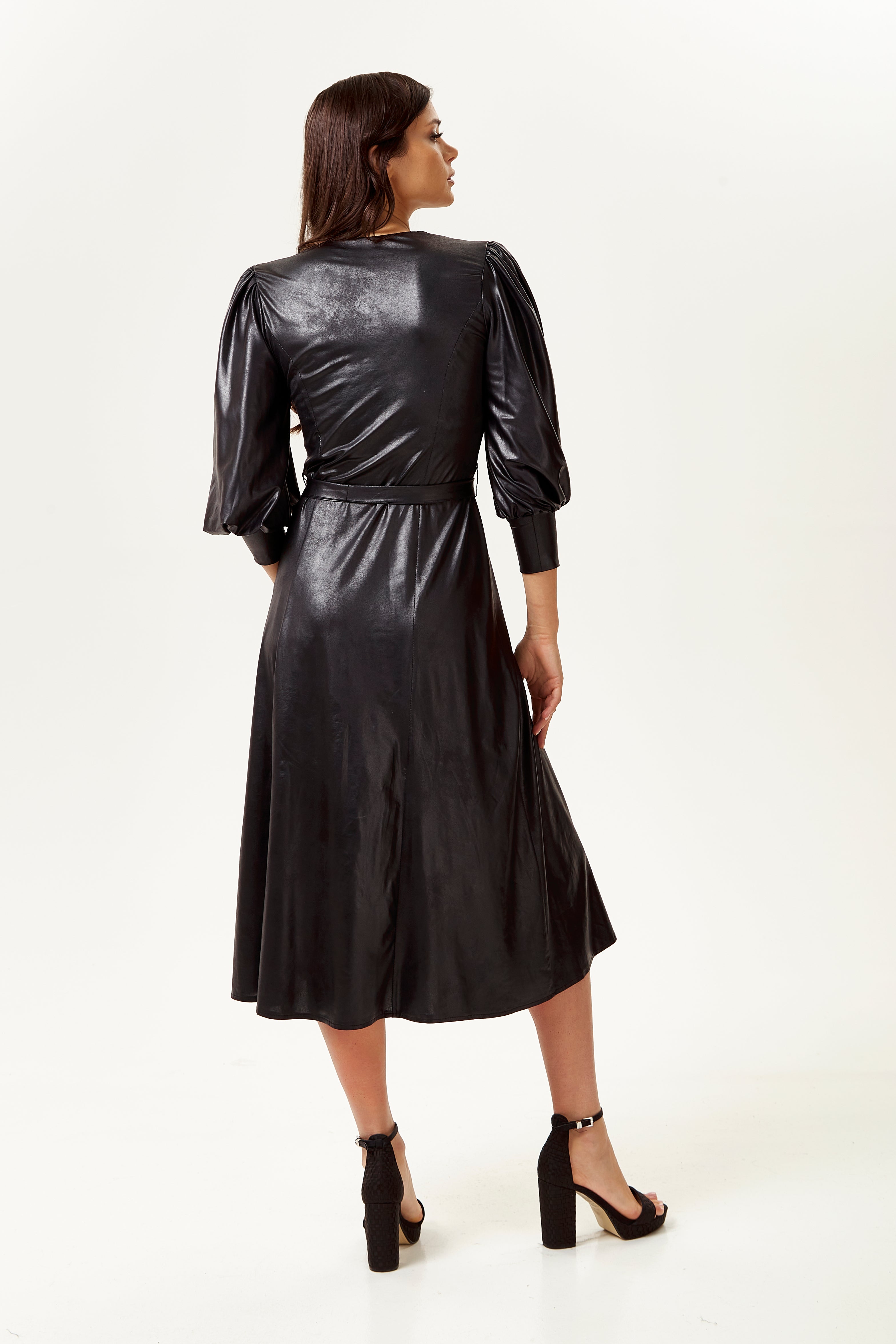 Explore designer dresses for women with the elegant Women's Midi Dress in Black. Shop Now!