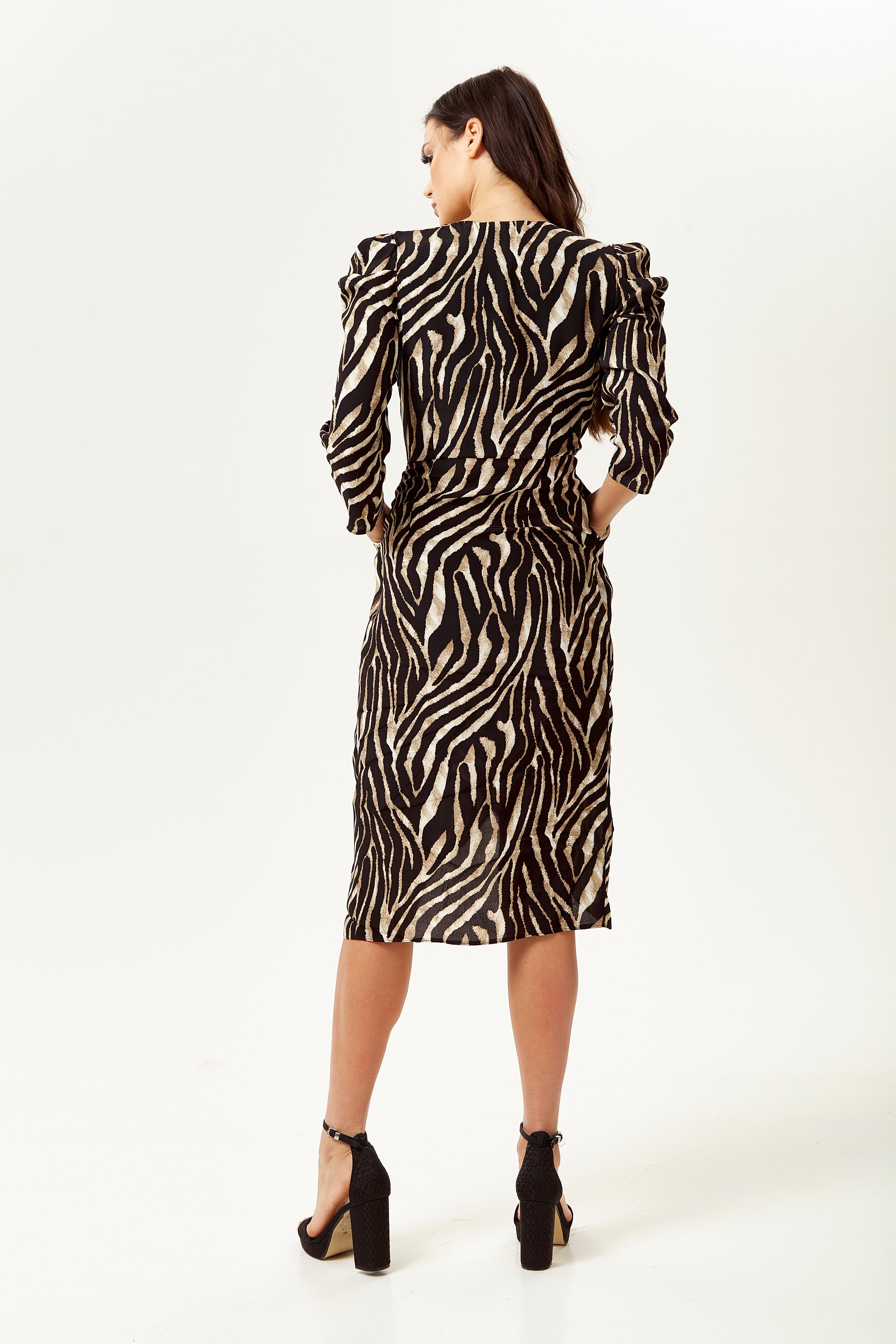 Discover perfect finds for women shopping, including the Women's Midi Wrap Dress. Shop Now!