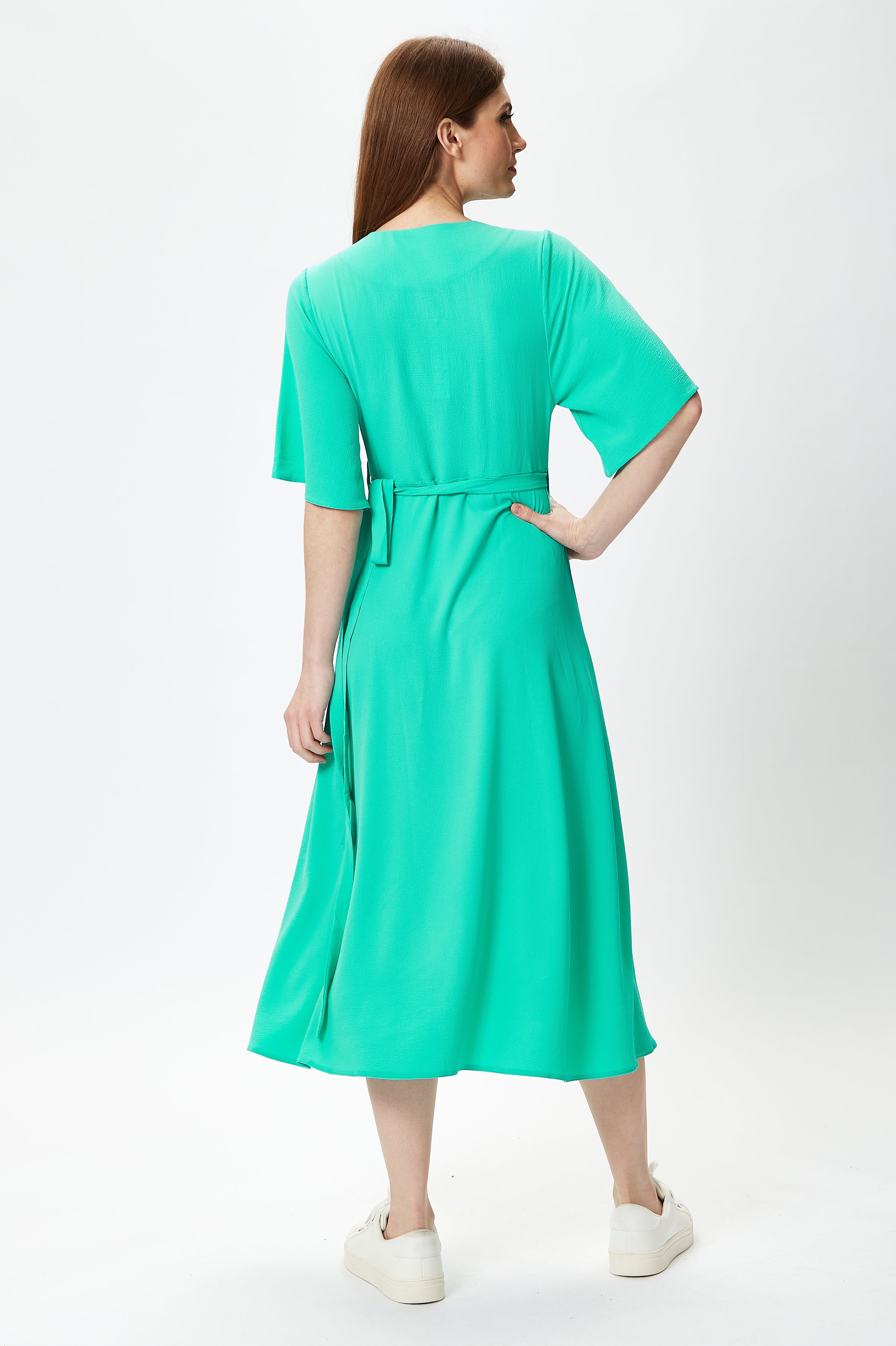 Elevate your look with luxury women's wear and the Women’s Midi Wrap Dress. Shop Now!