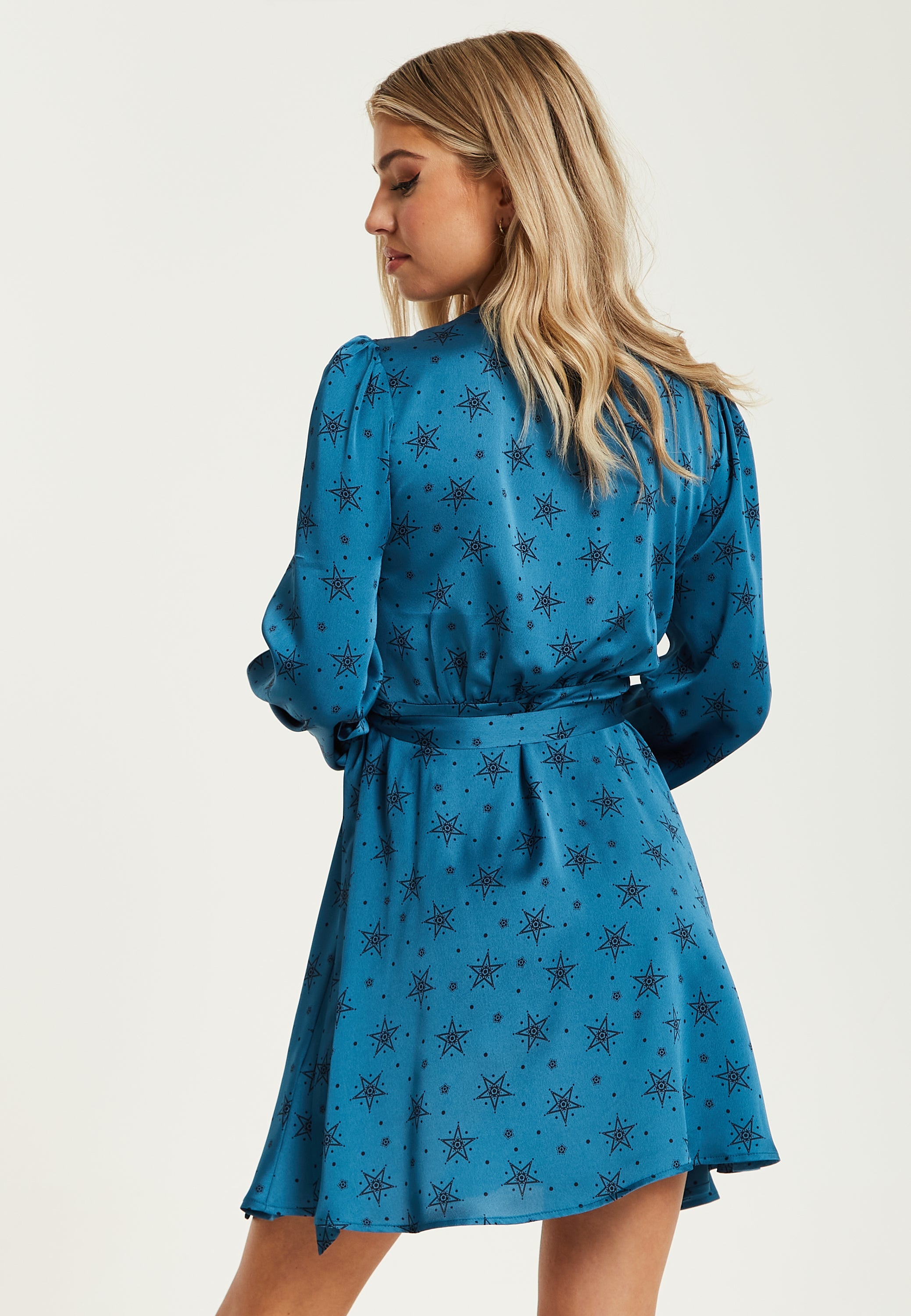 Women's Mini Dress in Petrol Blue with Long Sleeves, Black Star and Polka Dot Print Wrap Style by Liquorish