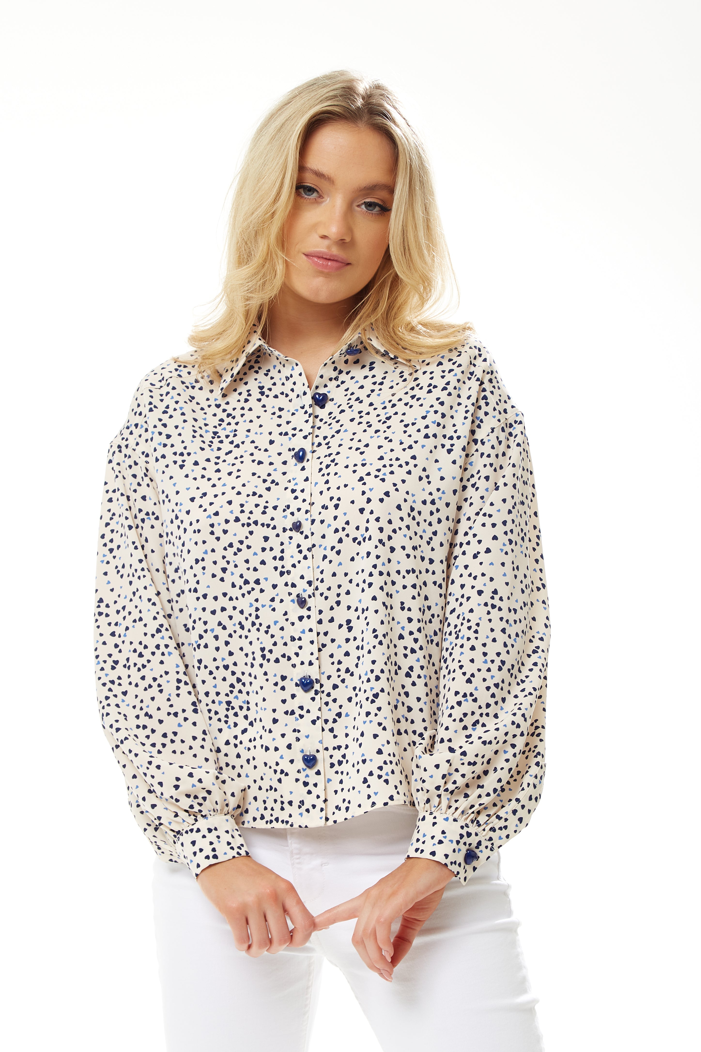 Women's Heart Print Shirt in Cream - Navy hearts, button-up front, heart-shaped buttons, collar, long sleeves, regular fit.