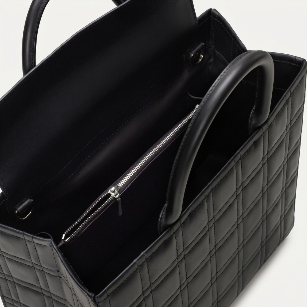 Leather tote bag with adjustable strap and compartments, pre order item. Shop online from our curated edit of premium fashion.