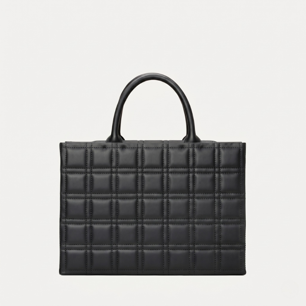 Leather tote bag with adjustable strap and compartments, pre order item. Shop online from our curated edit of premium fashion.