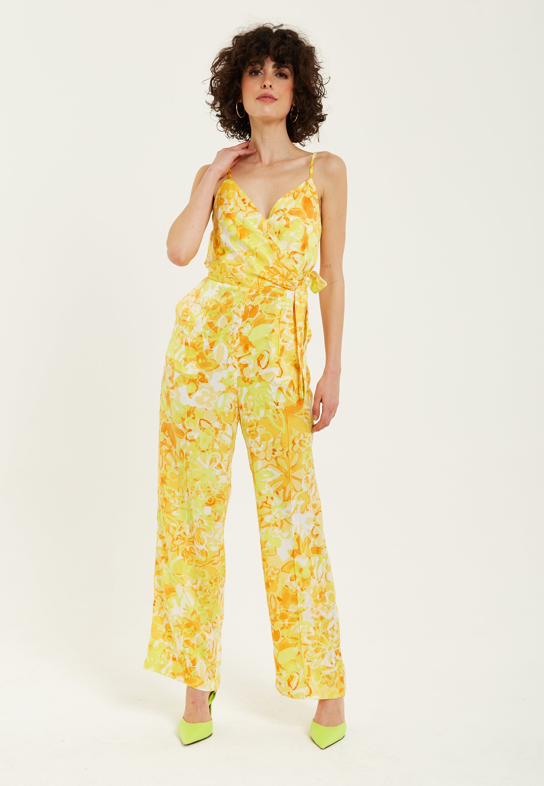 Women's Jumpsuit in Yellow and Orange Floral Print with V-Neck, Adjustable Straps, and Tie Waist - Liquorish
