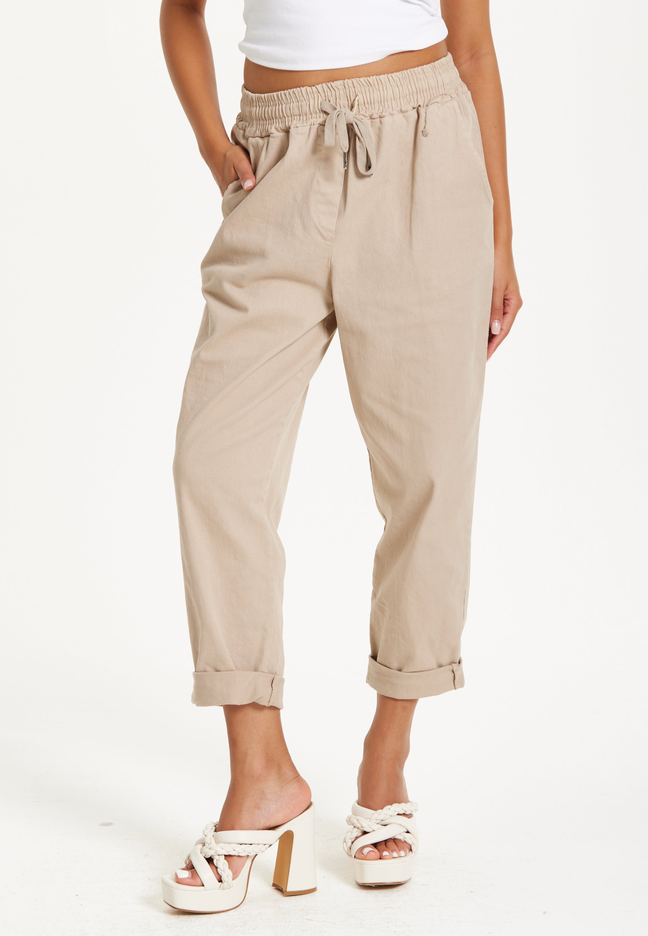 Beige Relaxed Fit Tapered Trousers