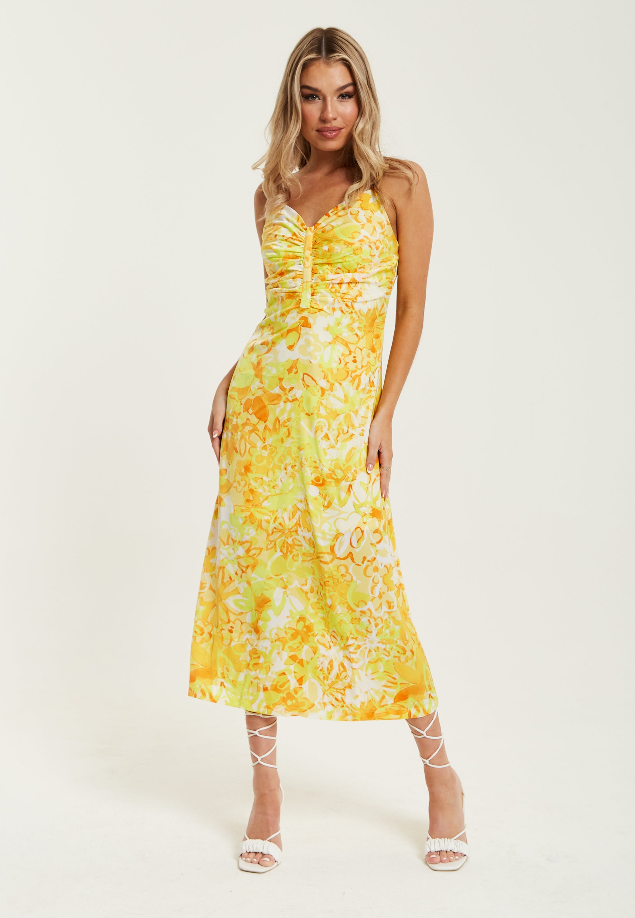 Women's Maxi Dress in Yellow and Orange Floral Print with Sleeveless Design and Ruching Detail - Liquorish