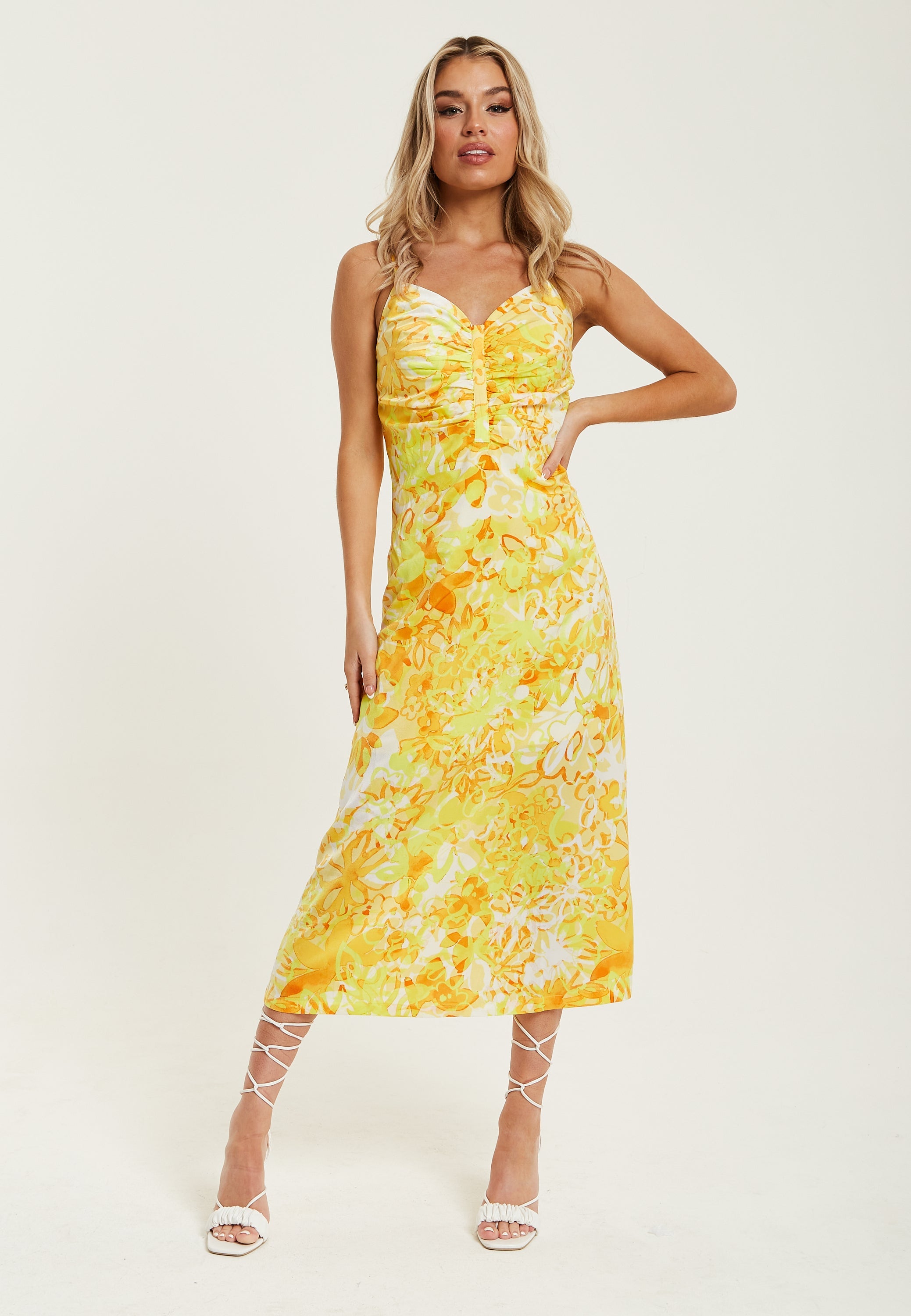 Women's Maxi Dress in Yellow and Orange Floral Print with Sleeveless Design and Ruching Detail - Liquorish