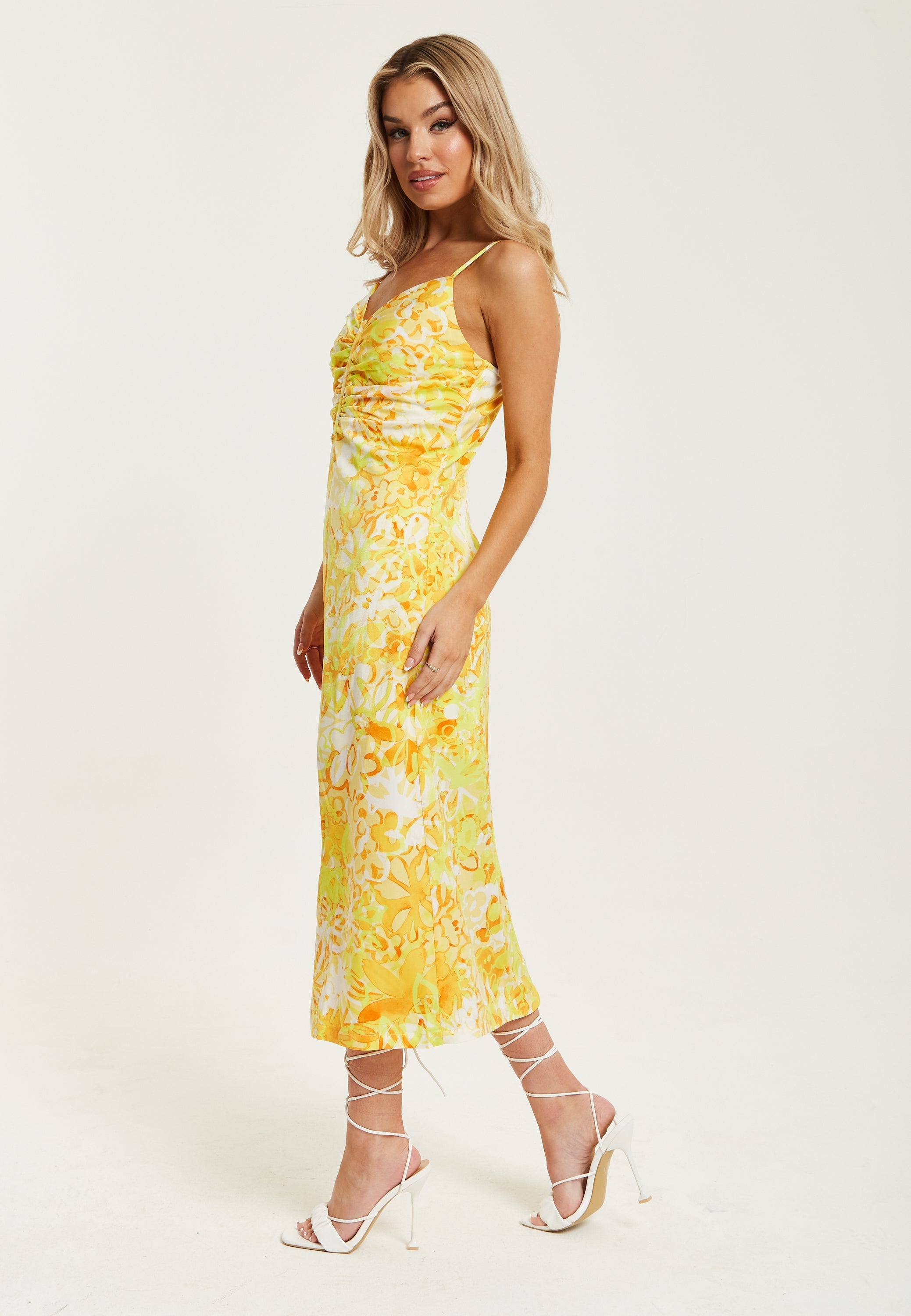 Women's Maxi Dress in Yellow and Orange Floral Print with Sleeveless Design and Ruching Detail - Liquorish