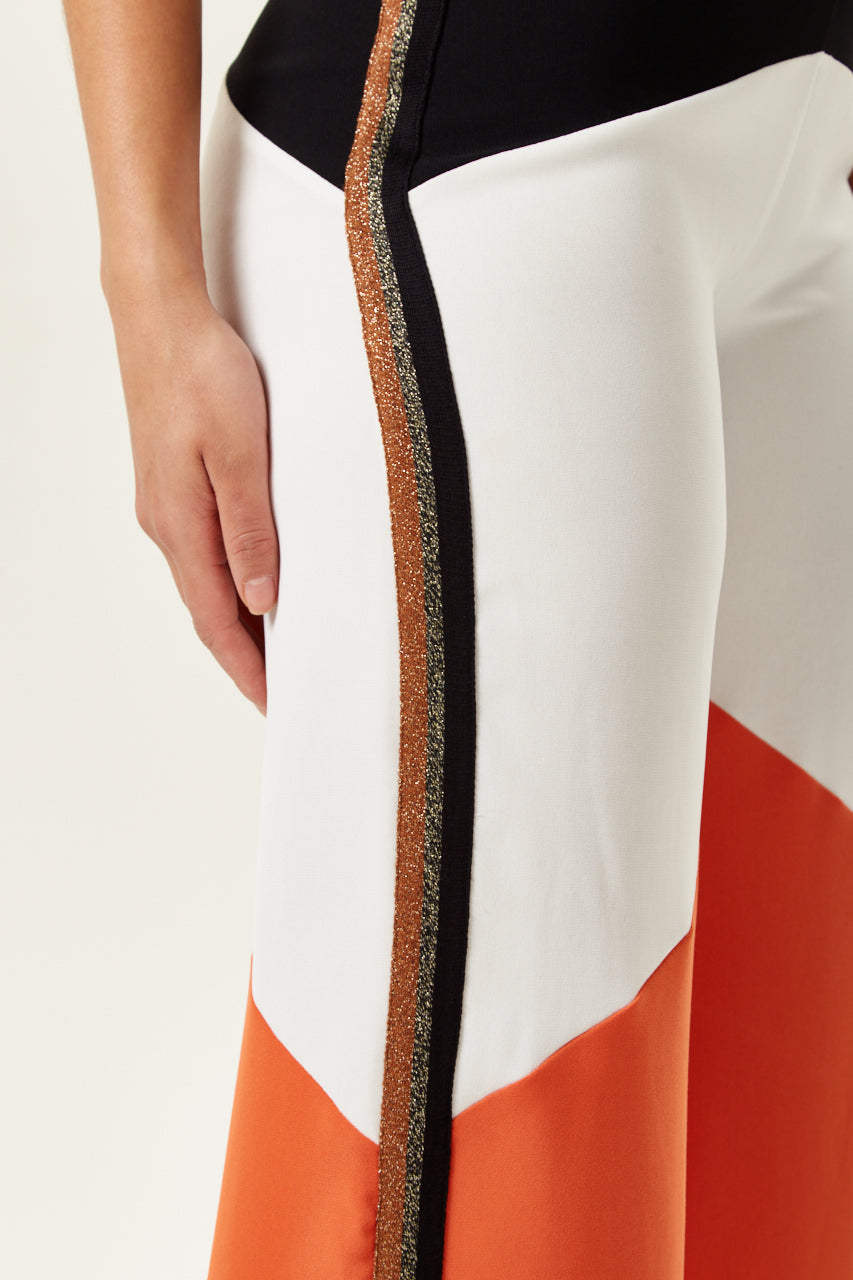 Shop luxury women clothing with a chic collection of Women's Trousers to elevate your style. Shop Now!