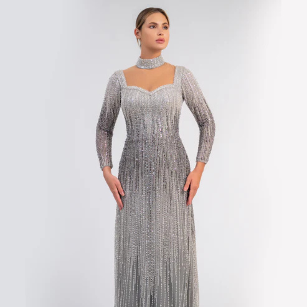 Shop online stunning ombré gown with shimmering sequins, sheer details and timeless elegance, perfect for parties and special occasions.