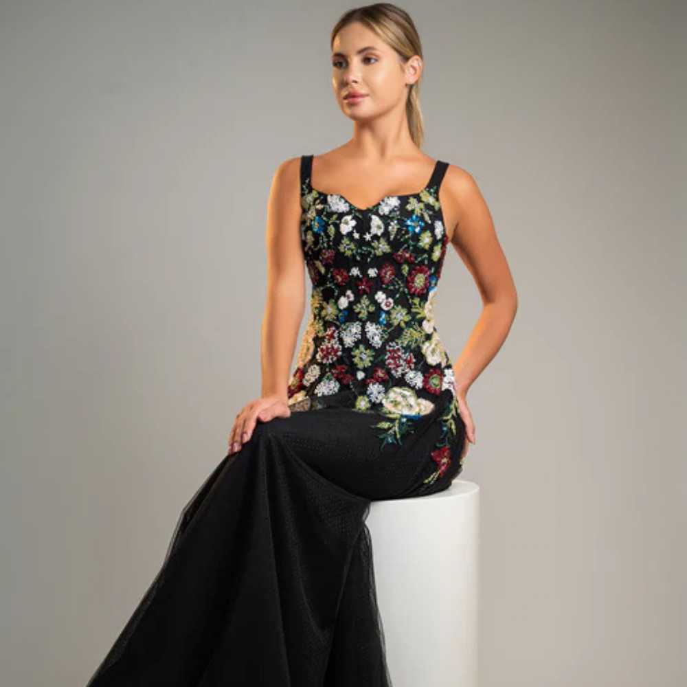 Shop online timeless black gown with blooming floral details and graceful flowing silhouette, perfect for parties, receptions and special occasions.