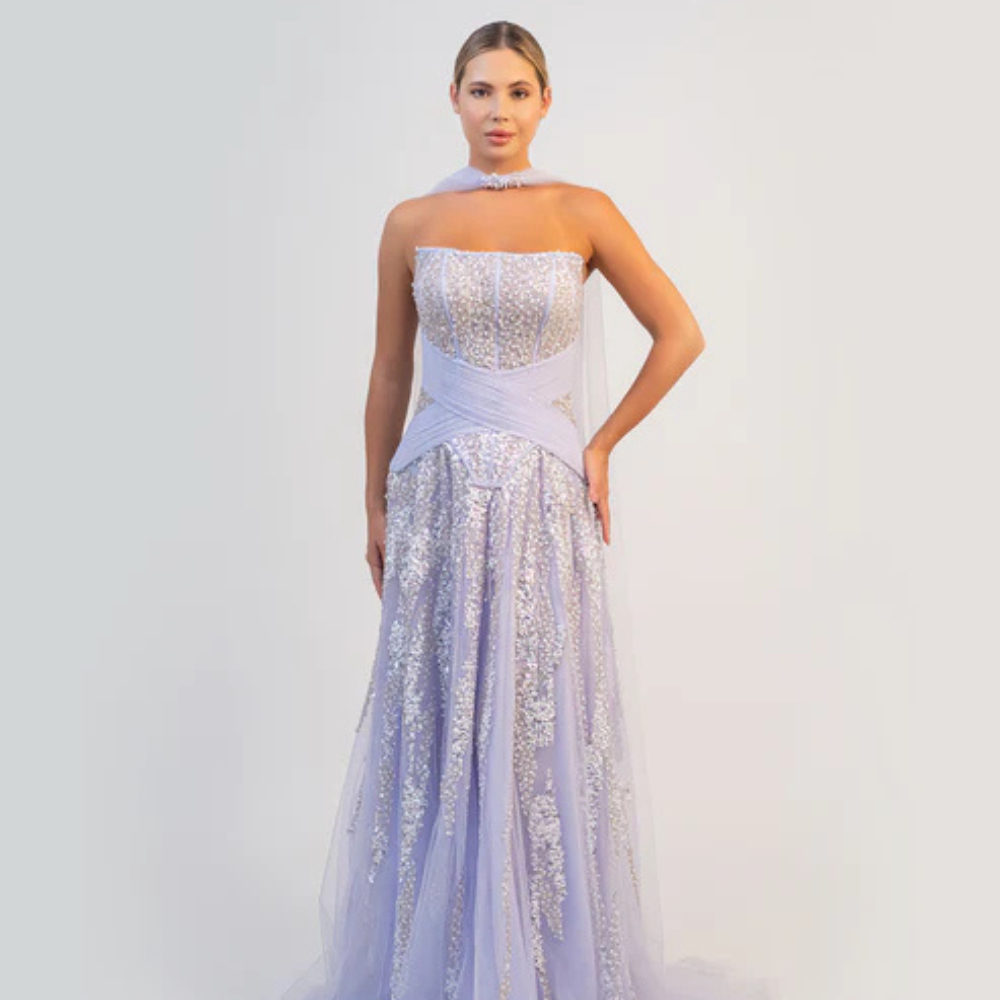 Shop online stunning lavender strapless gown with sparkling corset bodice and flowing shimmering tulle skirt, perfect for parties and special occasions.